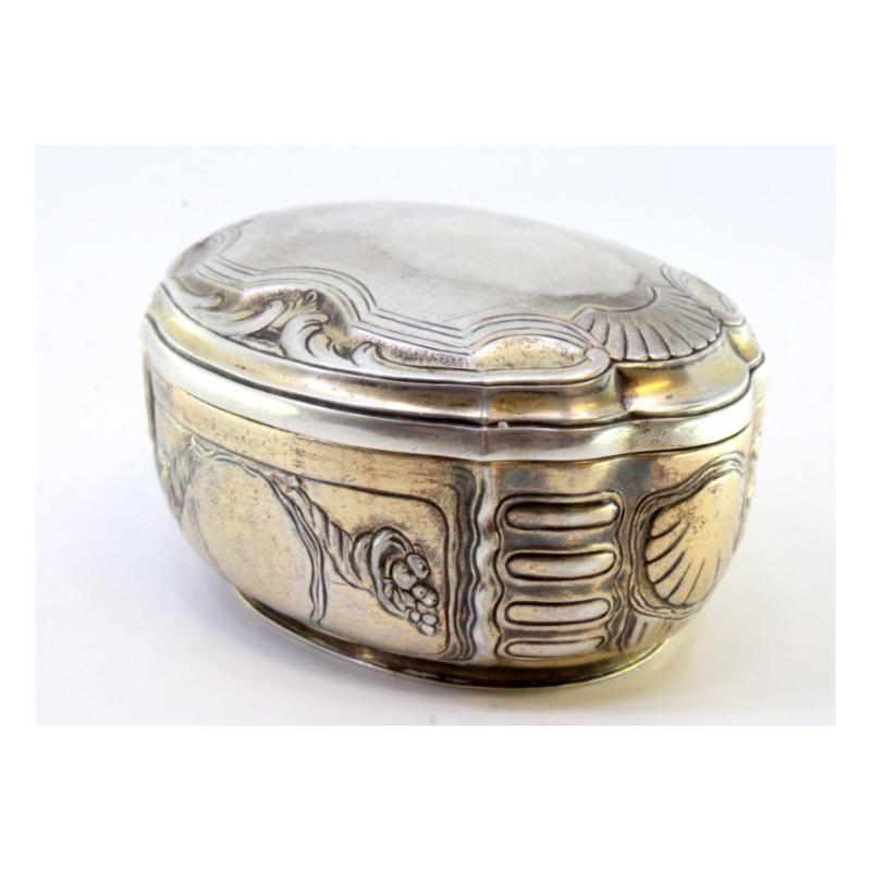 European Elliptical silver box with reliefs surrounding monogram cards, gold interior For Sale