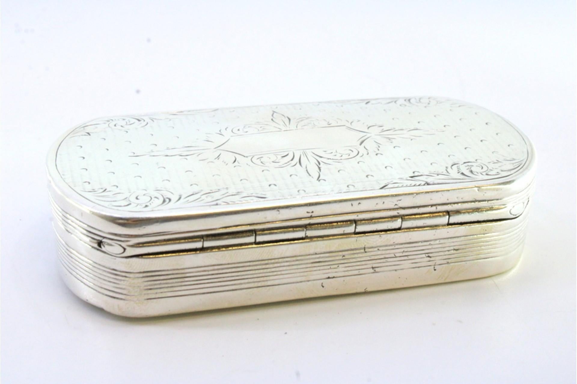 European Elliptical silver snuff box with friezes and monogram cartouche For Sale