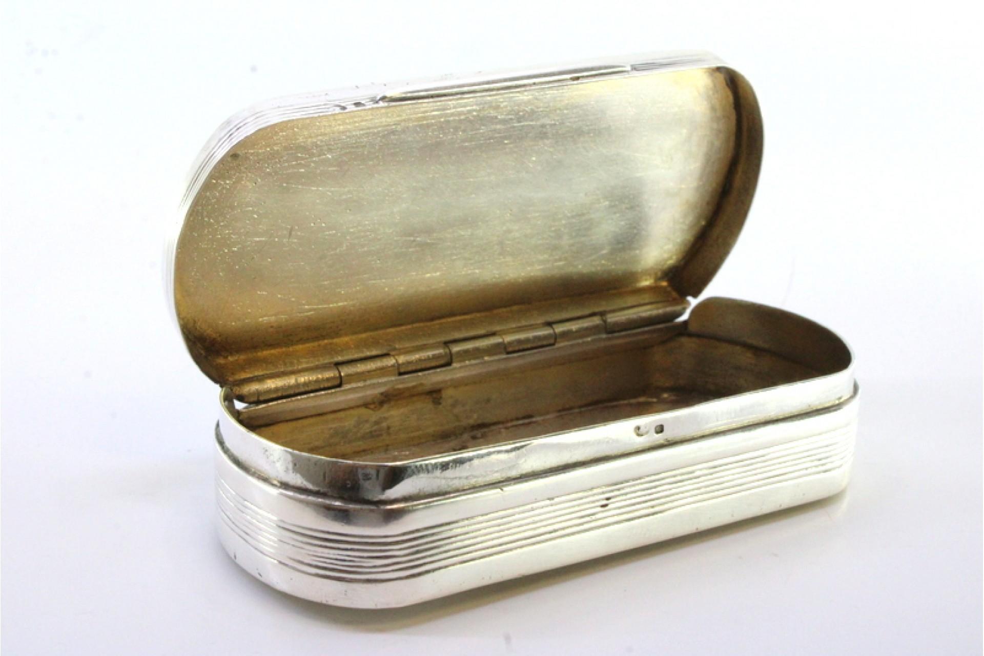 19th Century Elliptical silver snuff box with friezes and monogram cartouche For Sale