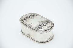 Elliptical silver soap dish with floral reliefs