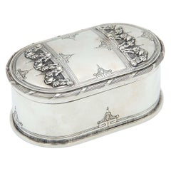 Elliptical silver soap dish with floral reliefs