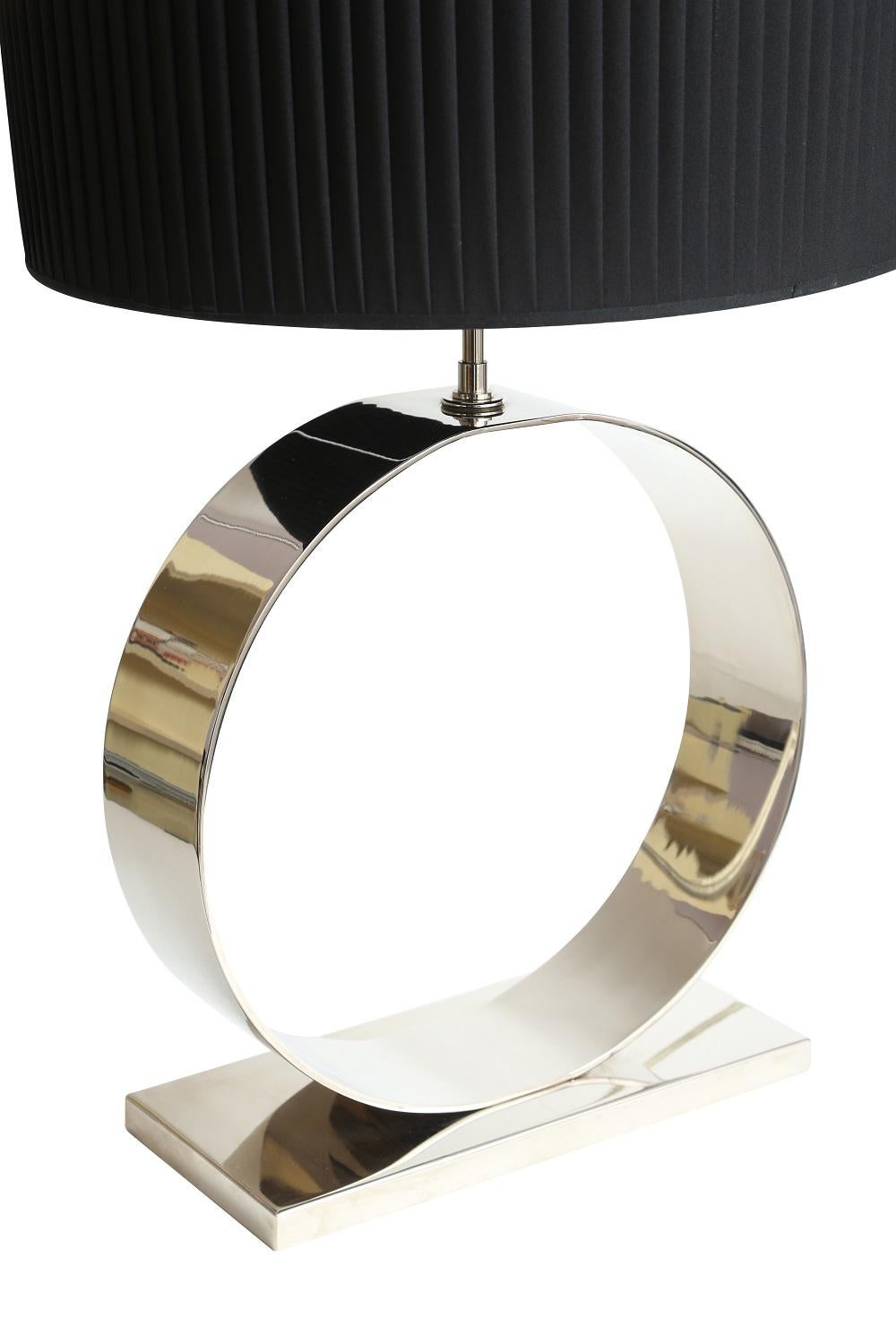 Modern table lamp by Selezioni Domus with a chrome base and black shade.

Dimensions:
Without shade: 16