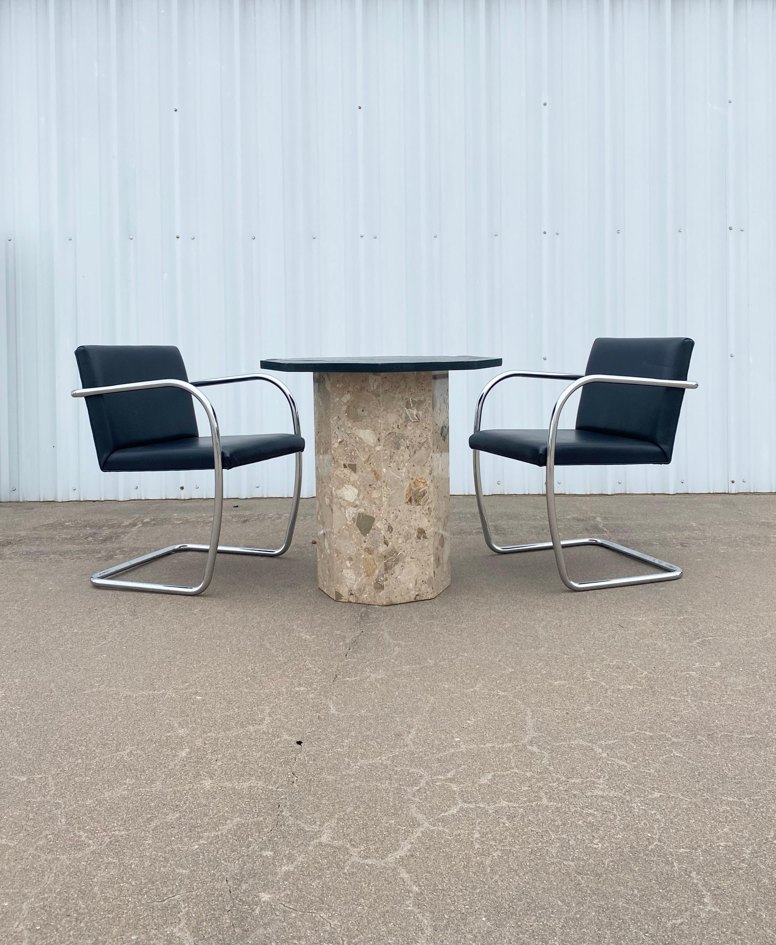 The texture and movement on this slate top is perfect. We love this as a game table or for an entry with a huge flowering branch…it’s the perfect bistro spot for 2-4, and works well outdoors. The inside of the base is marked 