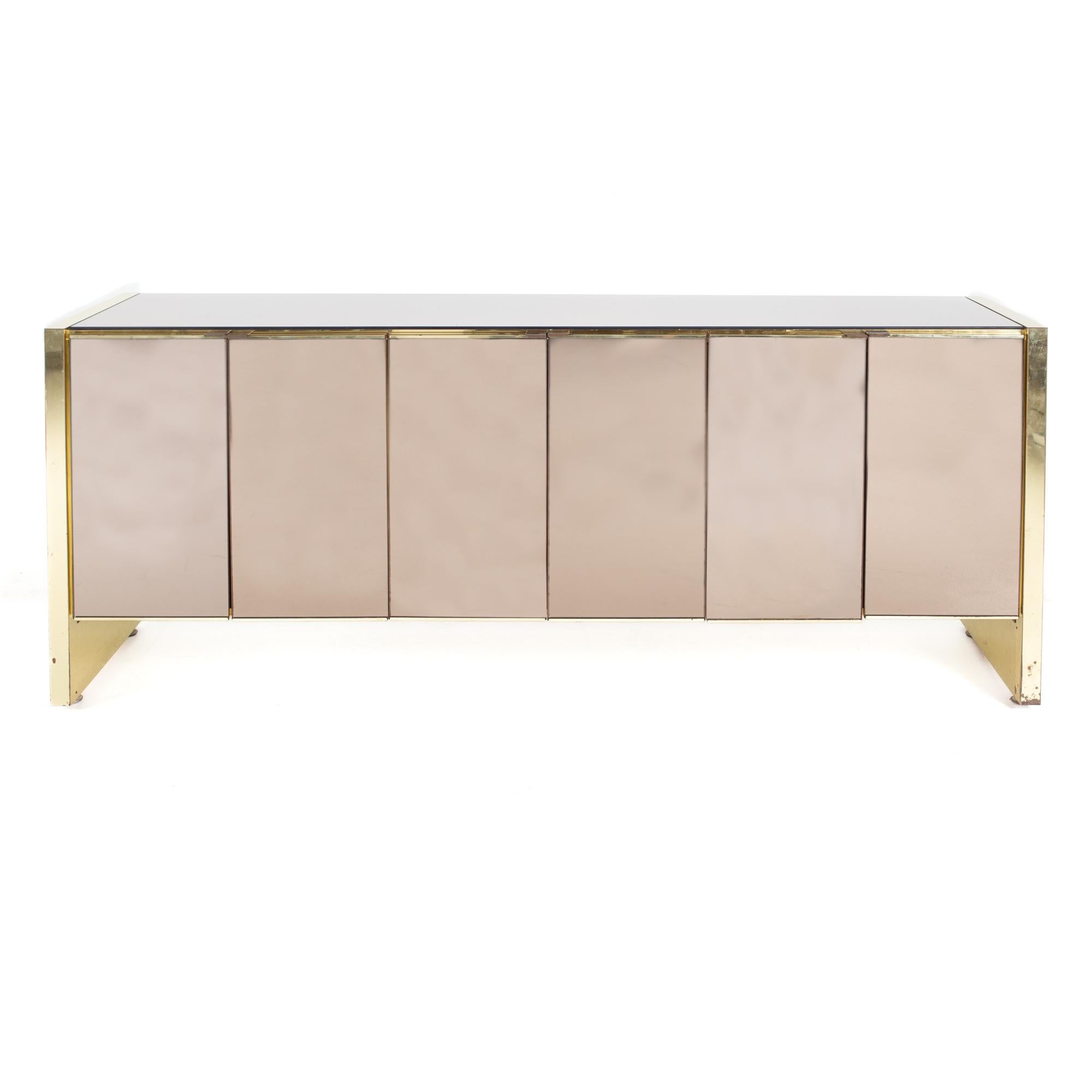 Ello mid century brass and mirrored sideboard credenza

This credenza measures: 75.5 wide x 20.5 deep x 29.5 inches high

All pieces of furniture can be had in what we call restored vintage condition. That means the piece is restored upon