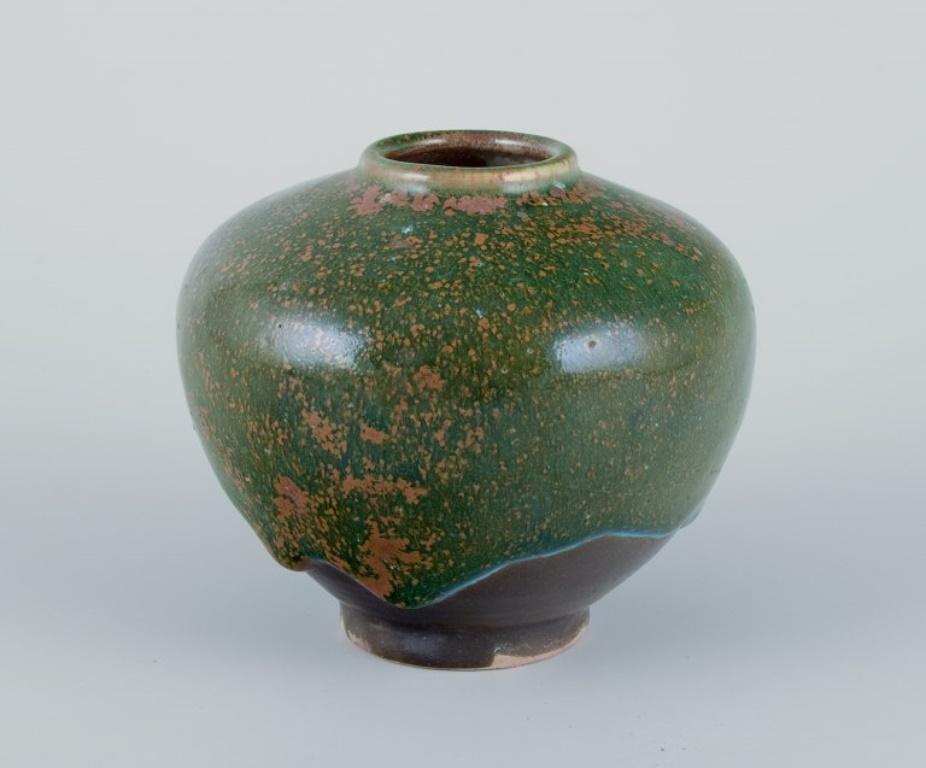 Late 20th Century Elly Kuch and Wilhelm Kuch, Germany. Two ceramic vases in green and brown tones For Sale