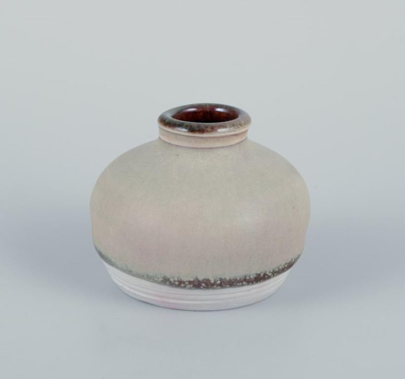 Late 20th Century Elly Kuch and Wilhelm Kuch. Two ceramic vases with sand-colored glaze. For Sale