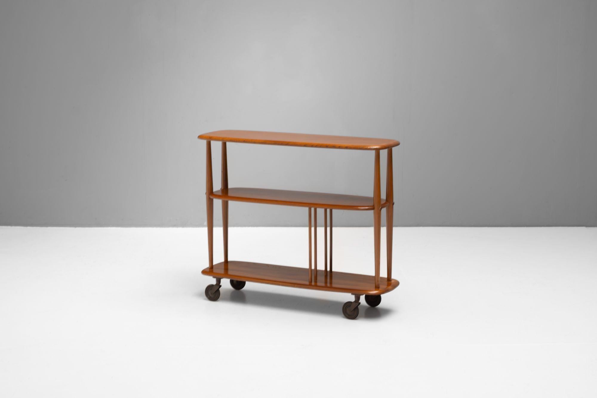 Elm Bookshelf by Lucian Ercolani for Ercol with original castors. Re-finished. U.K circa 1960.

H 75cm x W 92cm x D 32cm

Please be in touch for an accurate shipping quote.