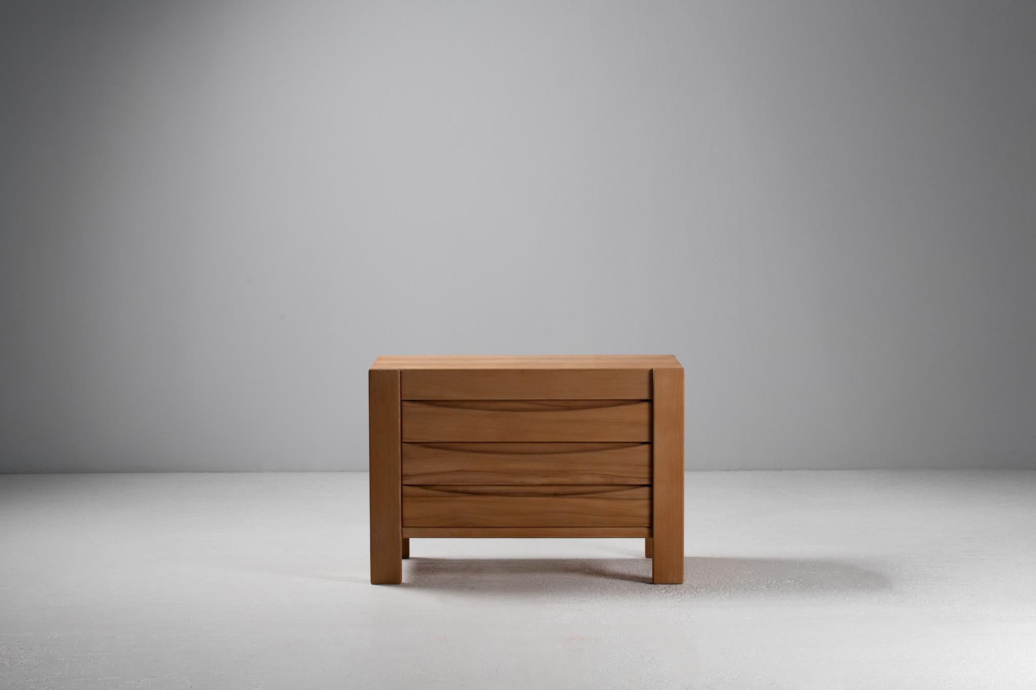 A quiet architecture of line and mass, this sideboard by Maison Regain evokes the serene power of essential form. The rectilinear façade is punctuated by four inset doors, each framed in broad stiles and rails, their only adornment the shallow