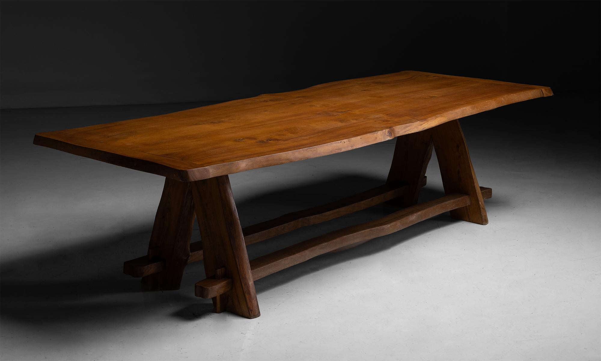 Elm Dining Table by Charles Flandre

France circa 1965

Live edge surface on splayed legs with two stretchers.

Measures 109.5”L x 39.5”d x 28.75”h