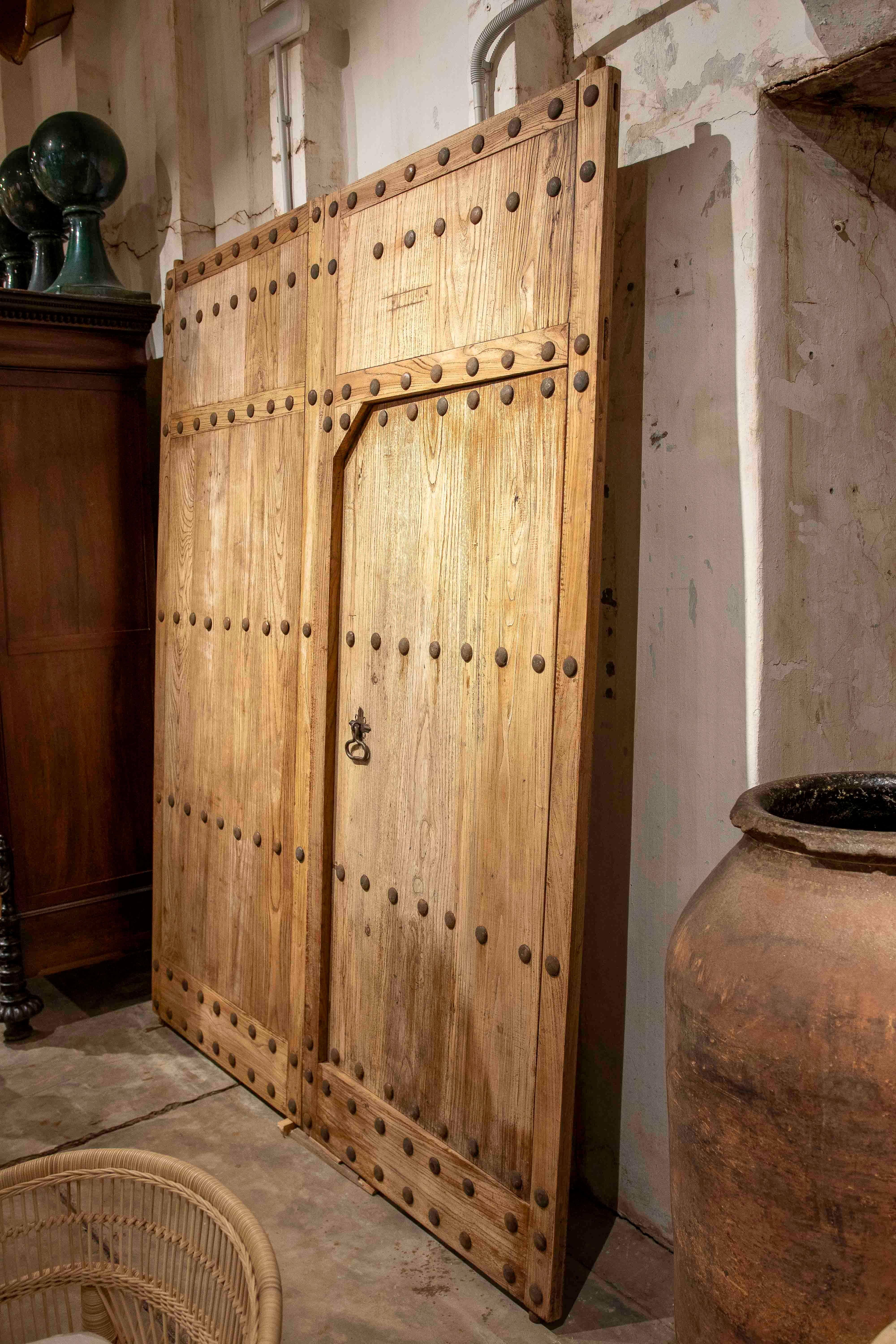 Spanish Elm Entrance Door in its Natural Colour with Iron Nails