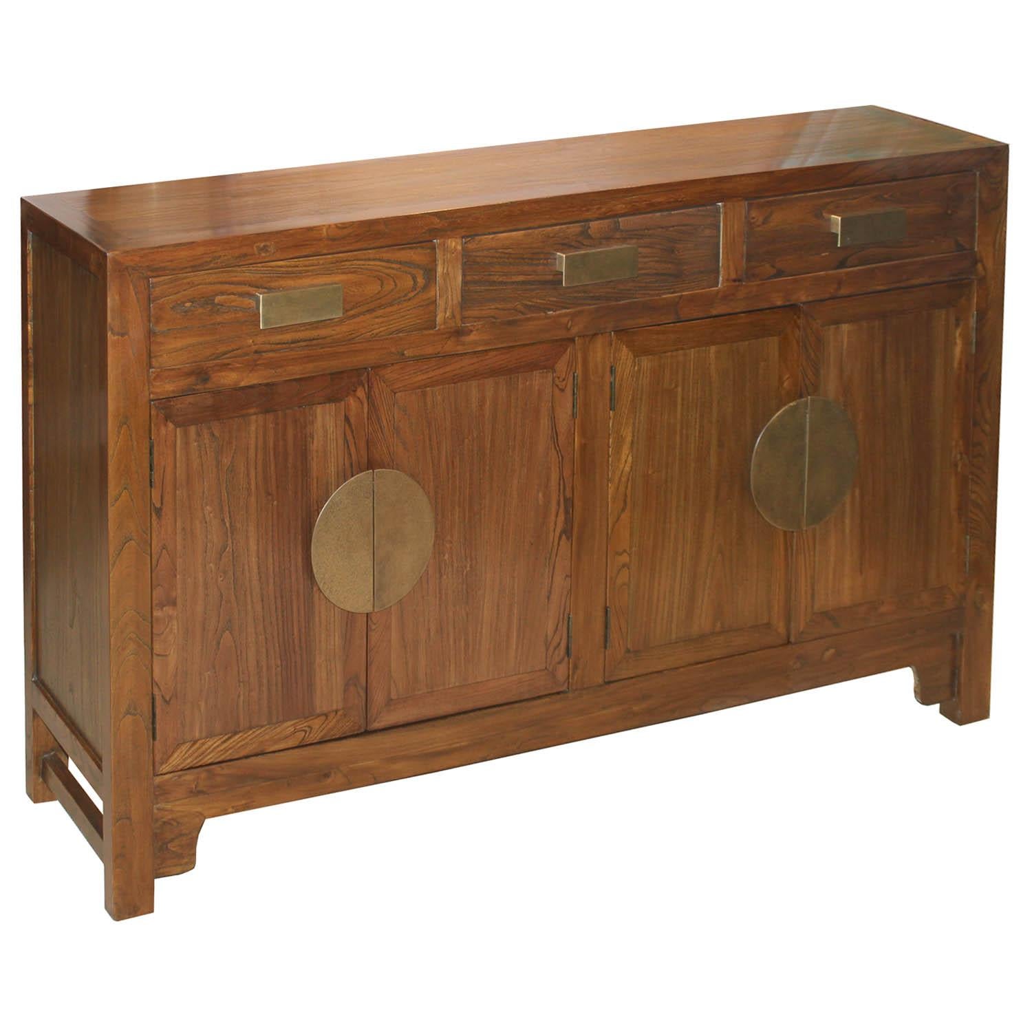 Contemporary sideboard with beautiful elm wood grain, and hand-hammered brass moon shaped hardware can be used behind a sofa or as a server in the dining room.