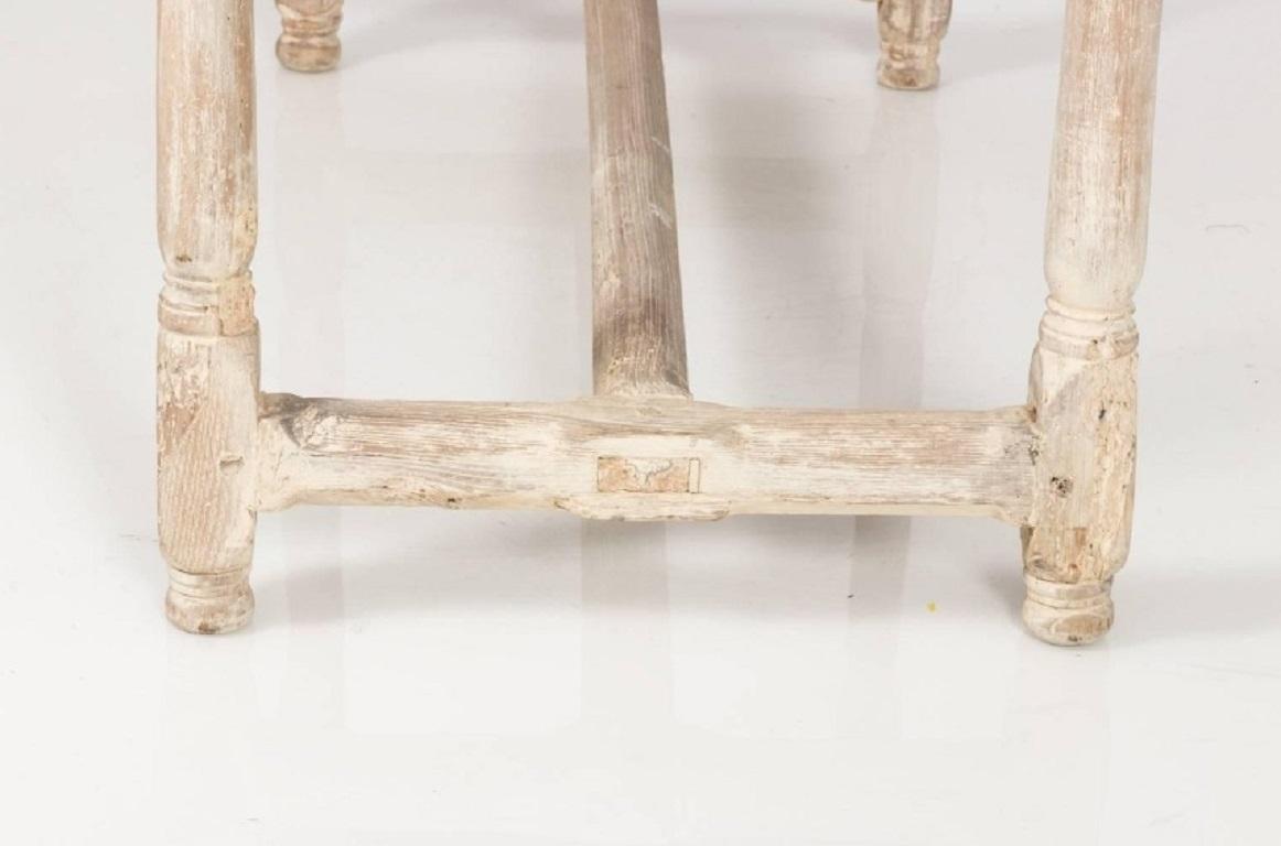 White washed elmwood table featuring a single cut of wood for the top in a rough hewn finish, circa 1890.