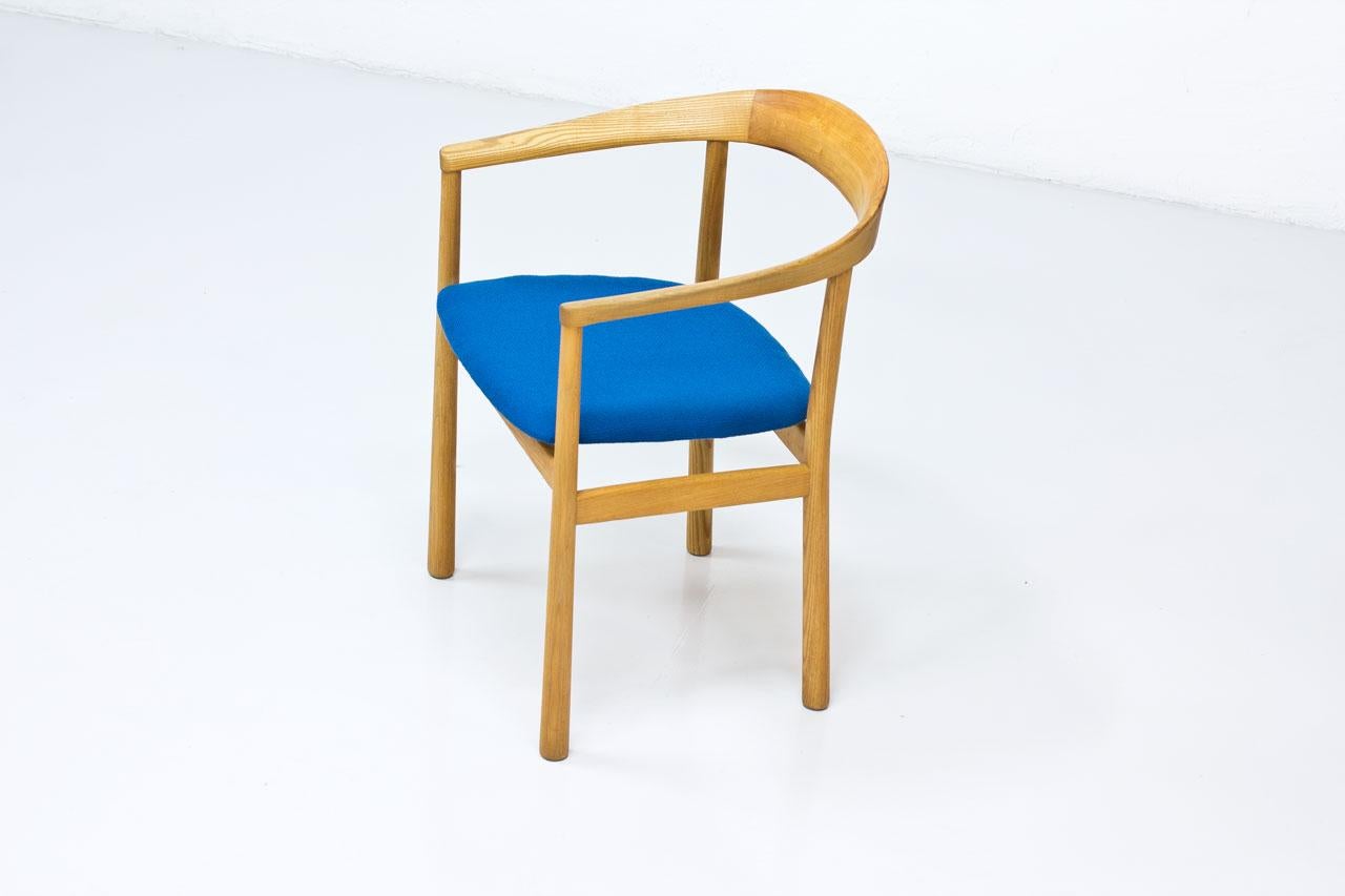 “Tokyo” armchair designed by Carl- Axel Acking. Originally made for the Swedish Embassy in Tokyo, 1959. Manufactured by Nordiska Kompaniet in Sweden. Made from elm, seat newly upholstered with vintage wool fabric from Knoll Textiles.