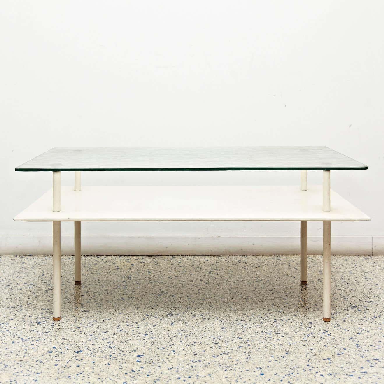 Coffee table designed by Elmar Berkovich, circa 1930.
Manufactured by Metz and Co. (Netherlands).
Tubular legs, wood shelve and thick glass top.

In good condition, with minor wear consistent with age and use, preserving a nice patina and a few