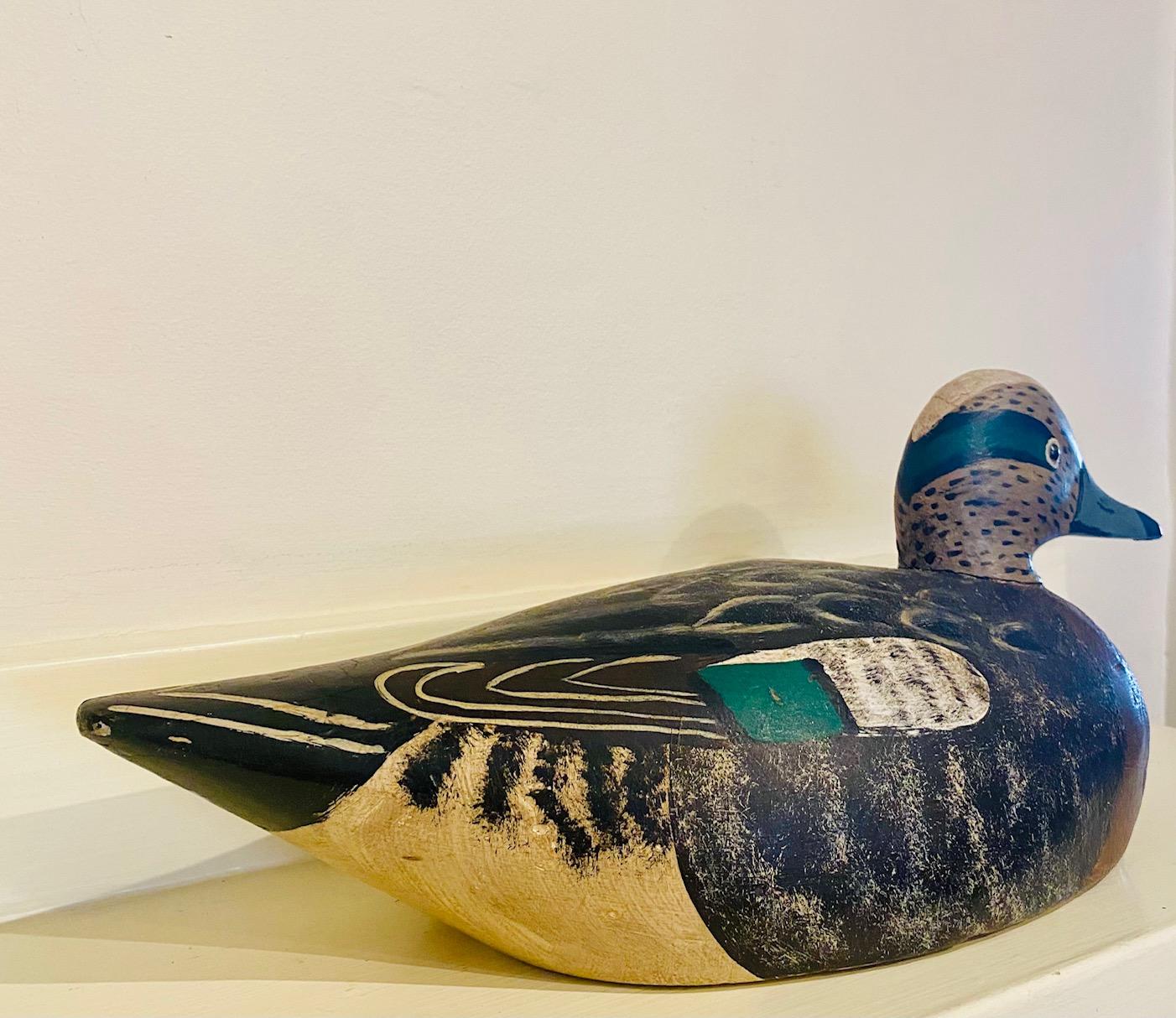Antique Widgeon Drake Decoy, circa 1940, by J. Elmer Crowell, East Harwich, MA (1862 - 1952), a hand carved and painted Widgeon or Baldpate drake decoy, signed with Crowell's rectangular stamp on the bottom.

Retains much of the original paint