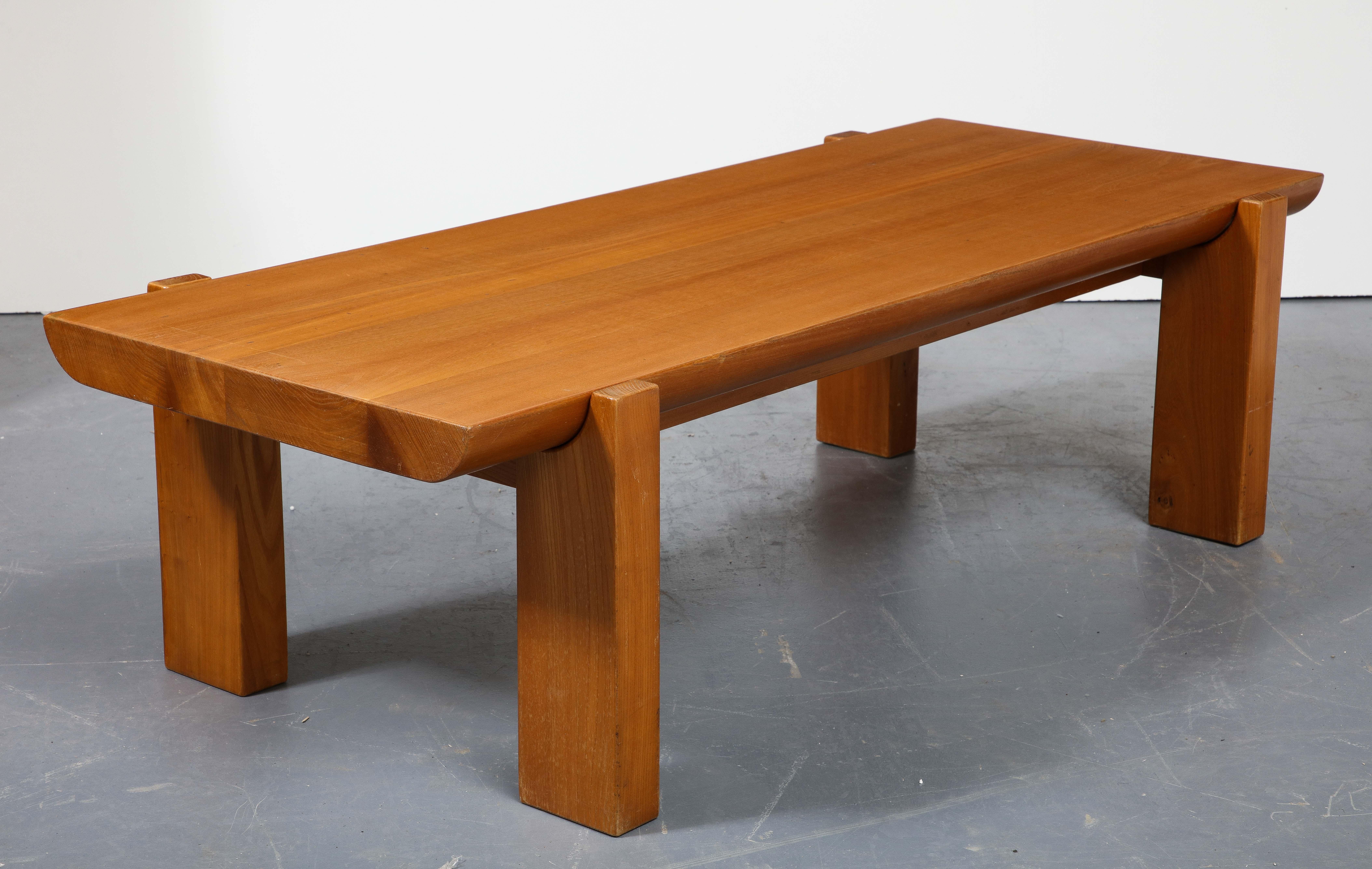 Elmwood coffee table by Luigi Gorgone, Italy, c. 1970s

This simple yet sleek coffee table consists of plank legs and a handsome elmwood top whose rounded shape fits seamlessly with the curvilinear frame.