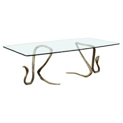 ELODIA Table de salle à manger sculpturale en laiton, cobra et verre