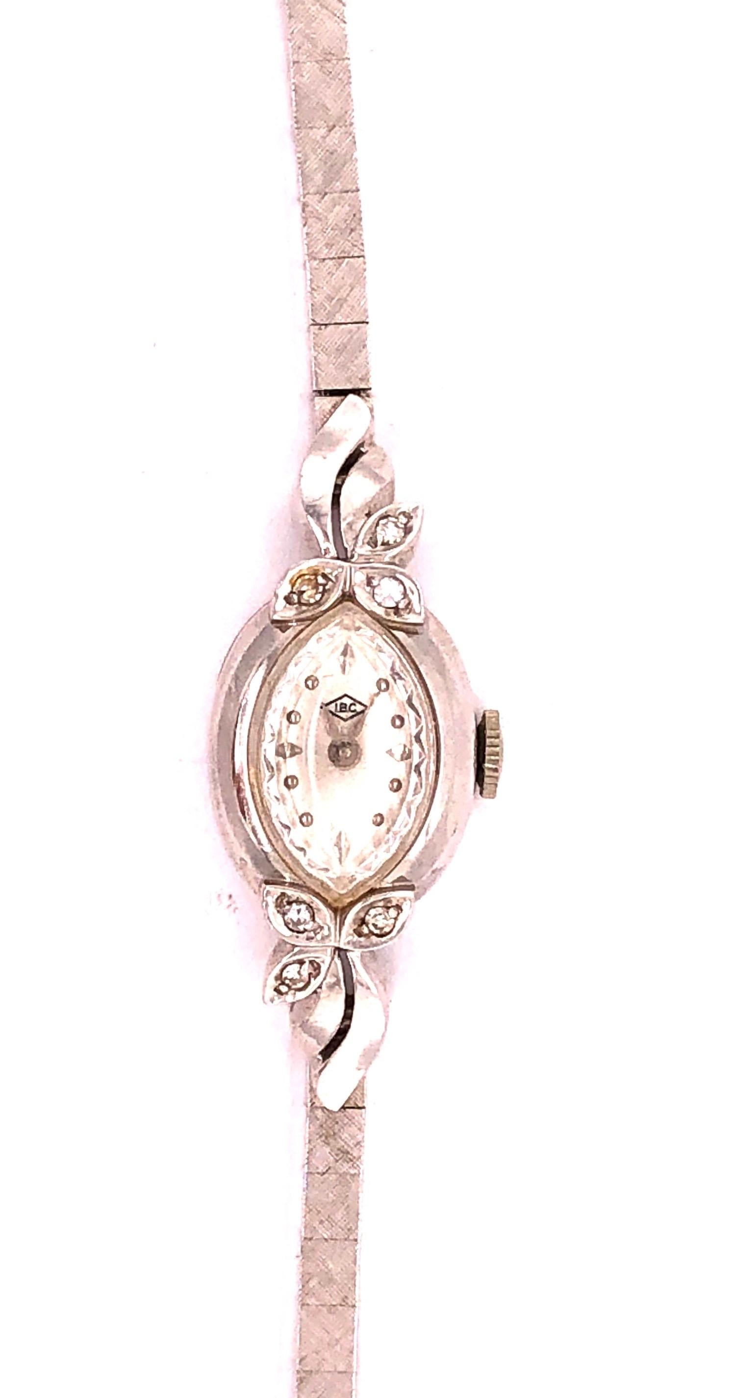 Art Deco Eloga 14 Karat Gold Ladies Wristwatch .10 Carat 15.7 Grams Swiss Six Diamonds For Sale