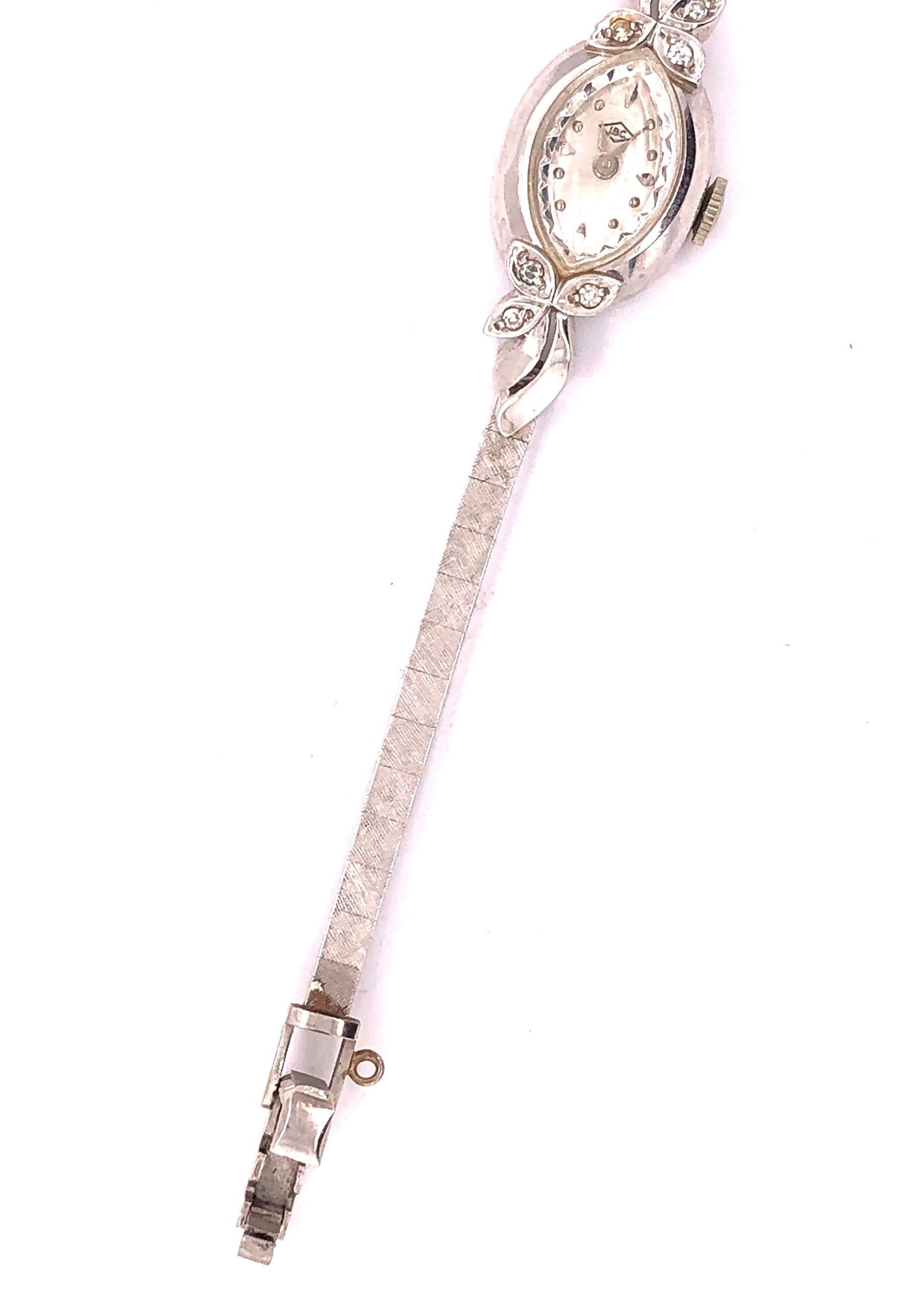 Eloga 14 Karat Gold Ladies Wristwatch .10 Carat 15.7 Grams Swiss Six Diamonds In Good Condition For Sale In Manhasset, NY