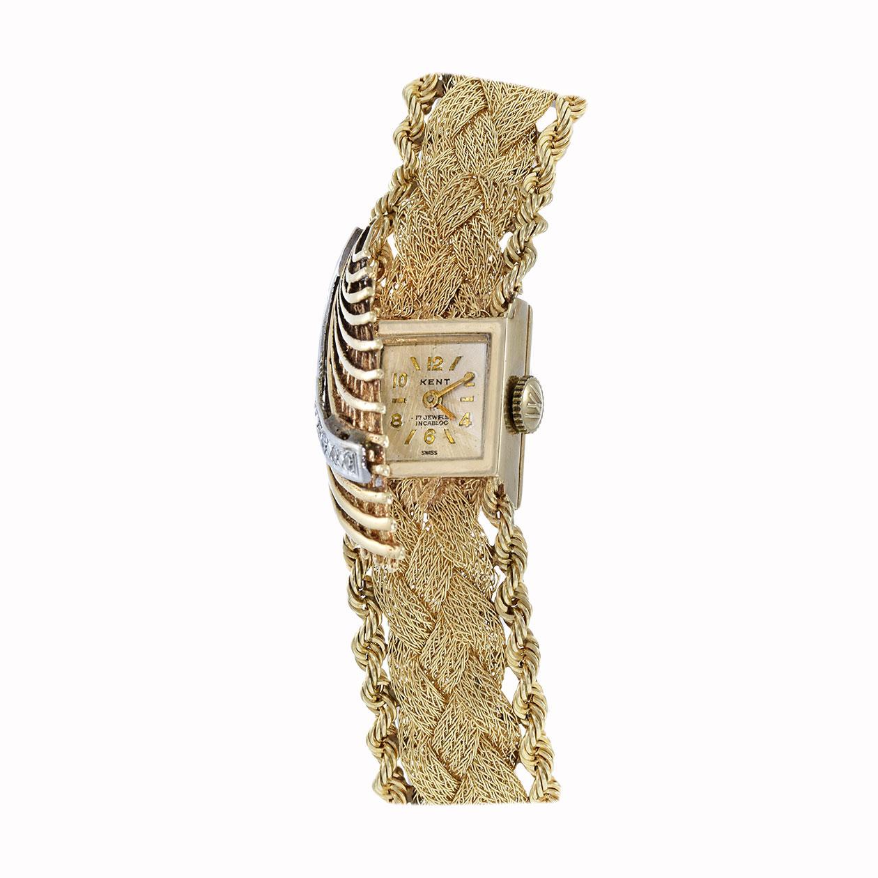 Introducing the Vintage 14kt Yellow Gold Eloga Kent Cocktail Watch, a timeless treasure exuding elegance and sophistication. Crafted with meticulous attention to detail, this exquisite timepiece features a 14x19mm rectangular case adorned with