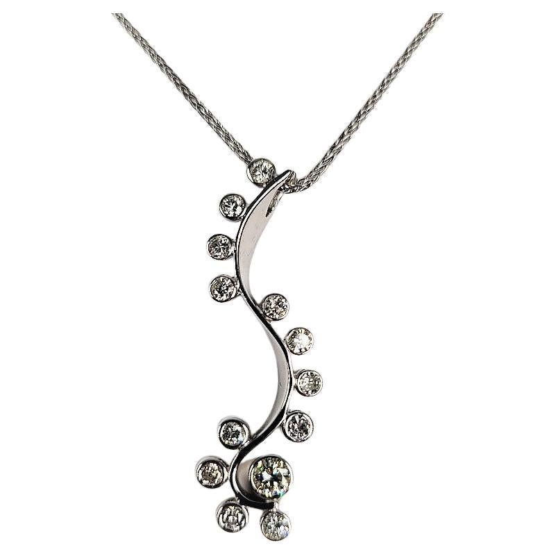 Elongated and Swirling 0.65 Carat Diamond Necklace For Sale