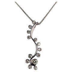 Elongated and Swirling 0.65 Carat Diamond Necklace
