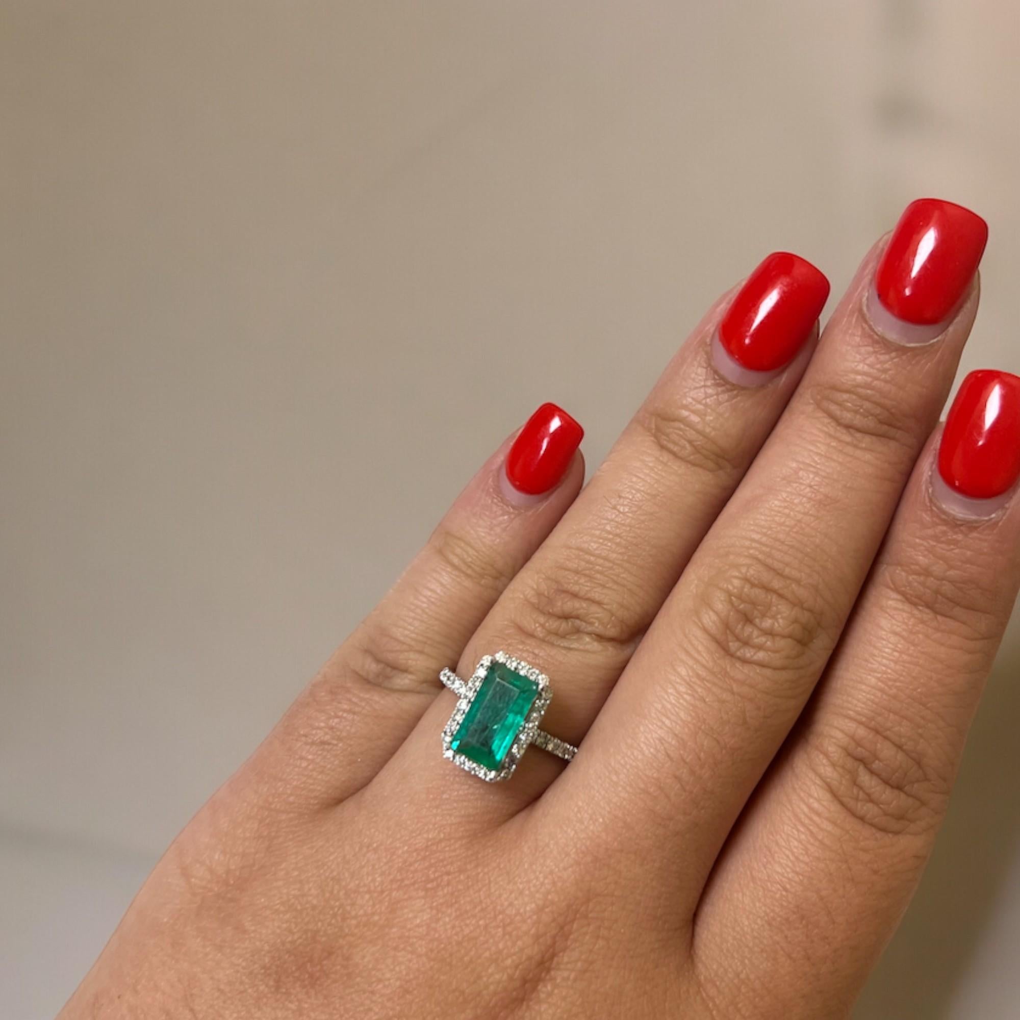 Elongated Emerald and Diamond Halo White Gold Statement Ring In New Condition For Sale In Lewisville, TX