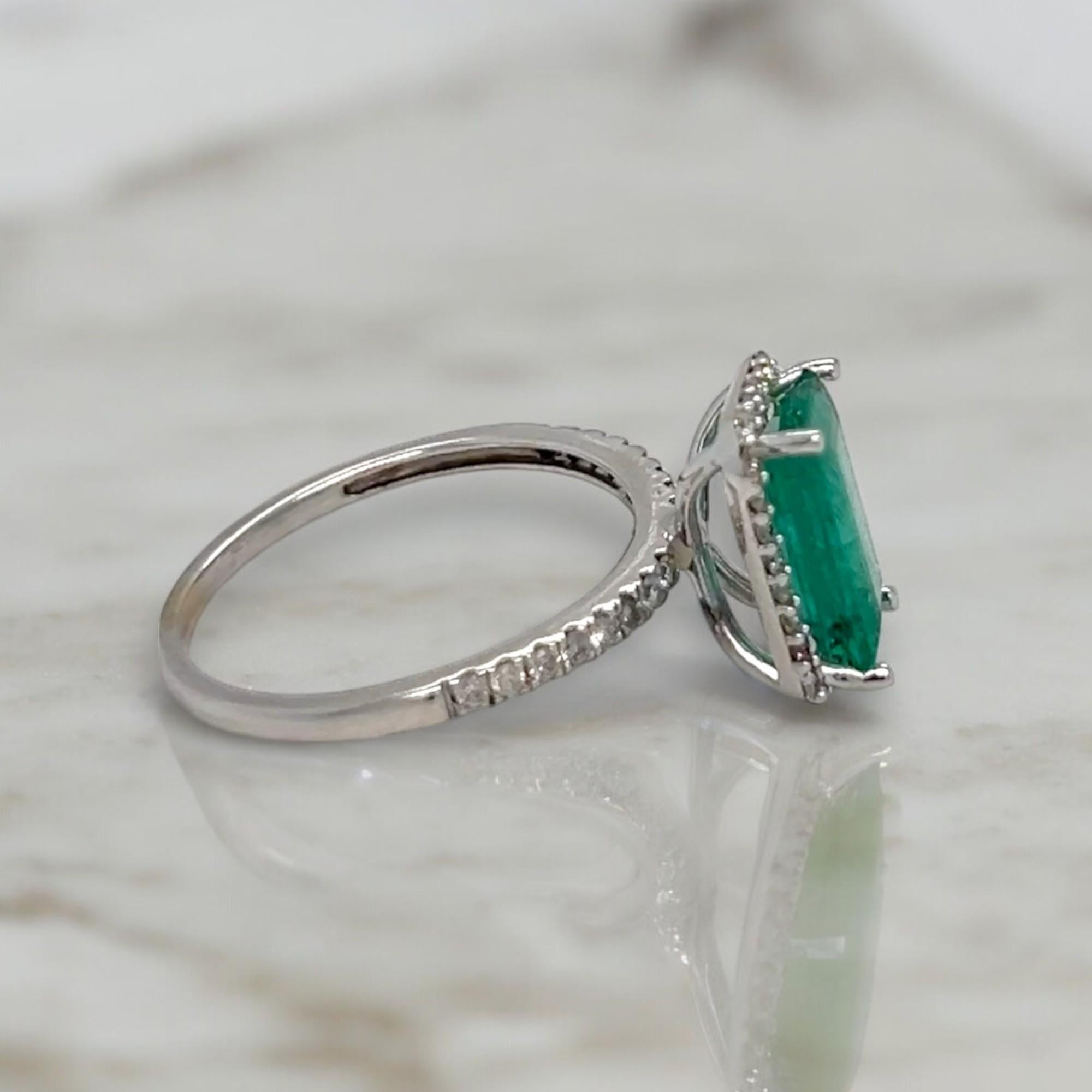 Women's or Men's Elongated Emerald and Diamond Halo White Gold Statement Ring For Sale