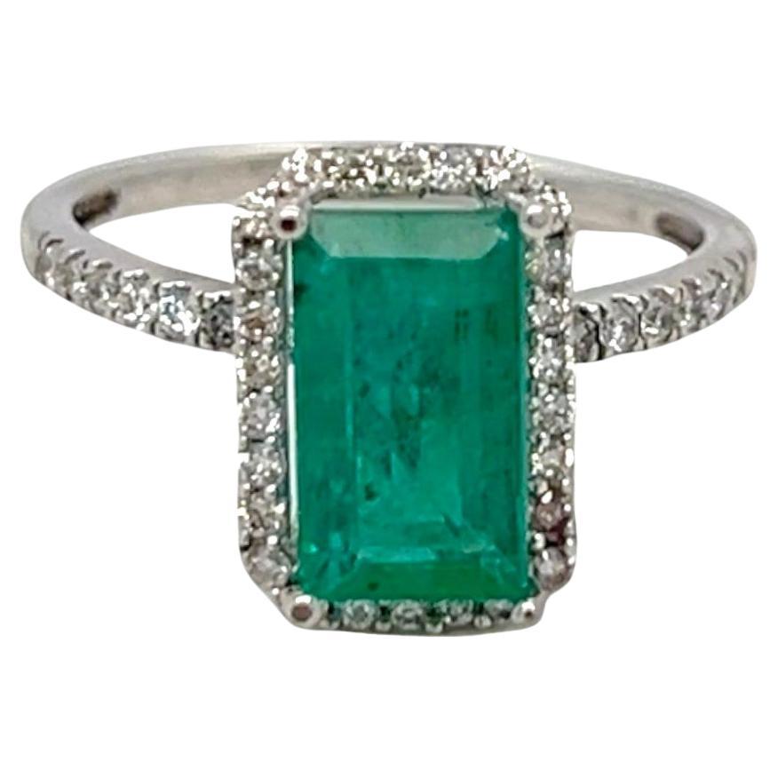 Elongated Emerald and Diamond Halo White Gold Statement Ring For Sale