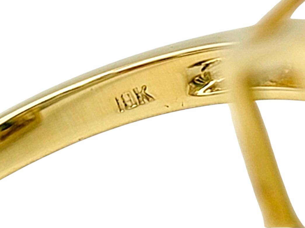 Women's Elongated Emerald Cut Tourmaline & Diamond Halo Cocktail Ring in 18 Karat Gold For Sale