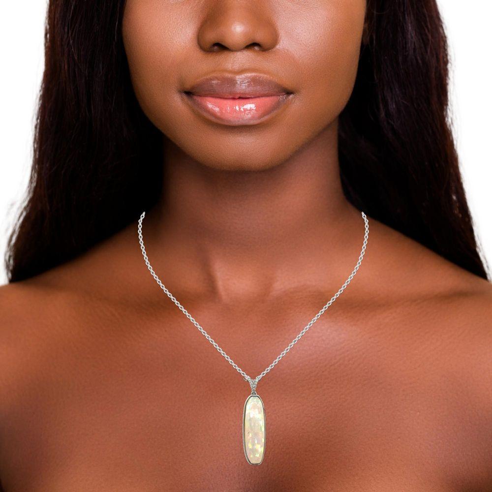 Pear Cut Elongated Ethiopian Opal and Diamond Pendant in 14KW Gold For Sale