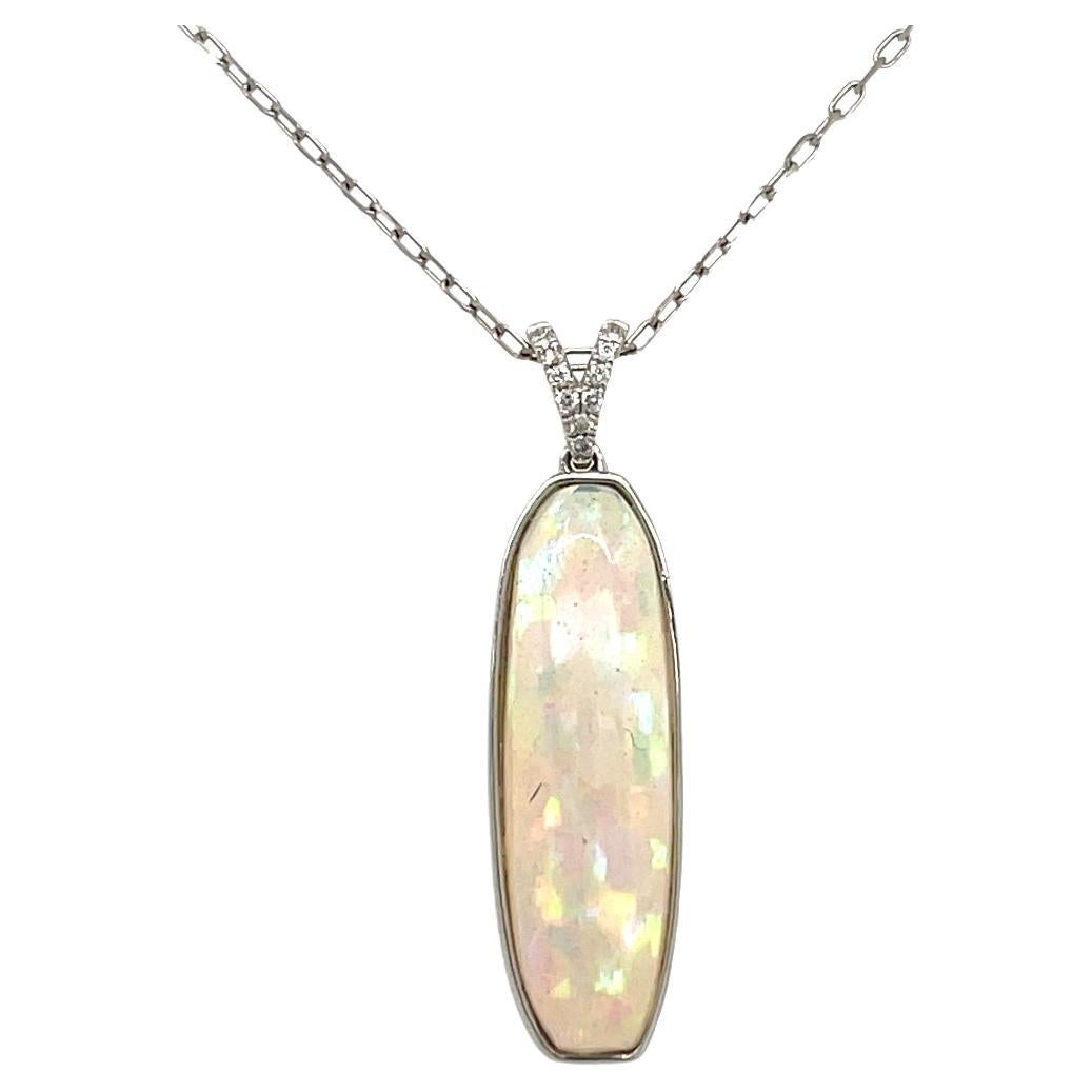 Elongated Ethiopian Opal and Diamond Pendant in 14KW Gold For Sale