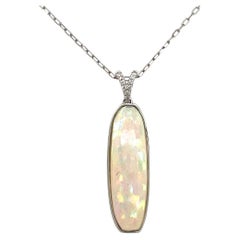 Elongated Ethiopian Opal and Diamond Pendant in 14KW Gold