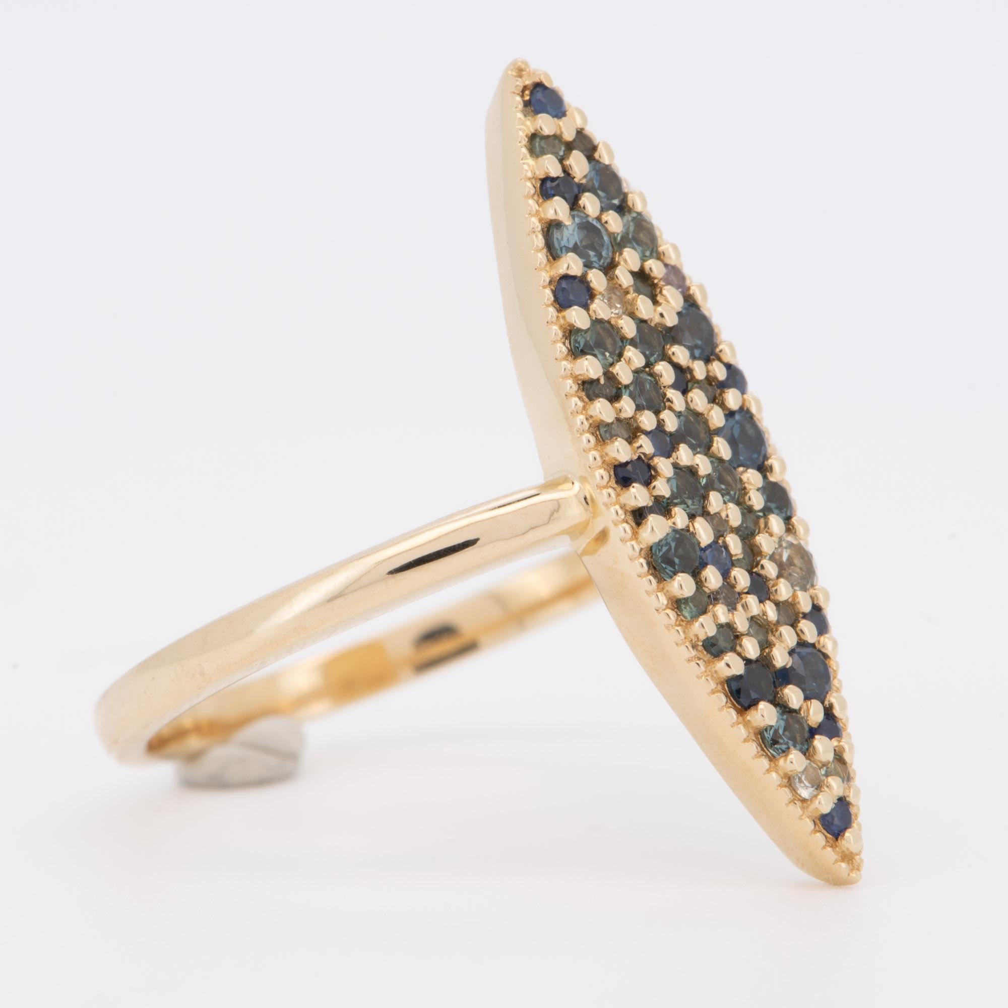♥ Stunning elongated navette ring set with a cluster of multi-color sapphires, ranging from light yellow, green, teal blue, to dark blue; a delicate milgrain edge dots the outline of the setting for a vintage effect.
♥ The setting measures 24.3mm in