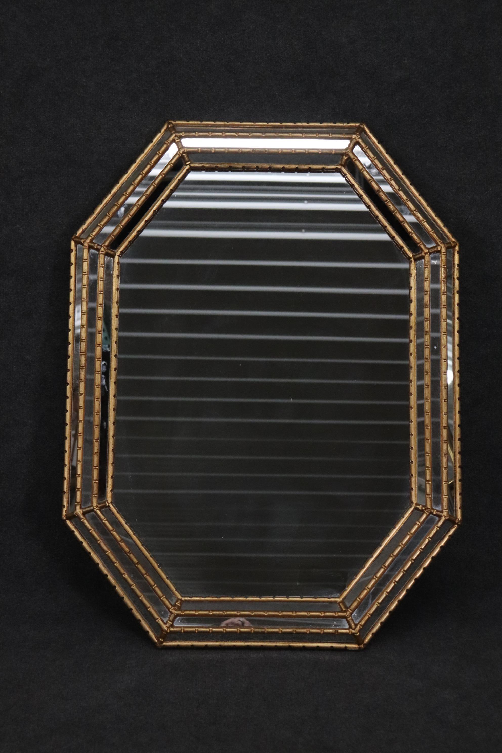 This is a gorgeous Italian-made mirror for decorative Arts. I have had a few in the past and this one is gorgeous. The mirror measures 31 wide x 43 tall x 2 inches deep and is in good condition.