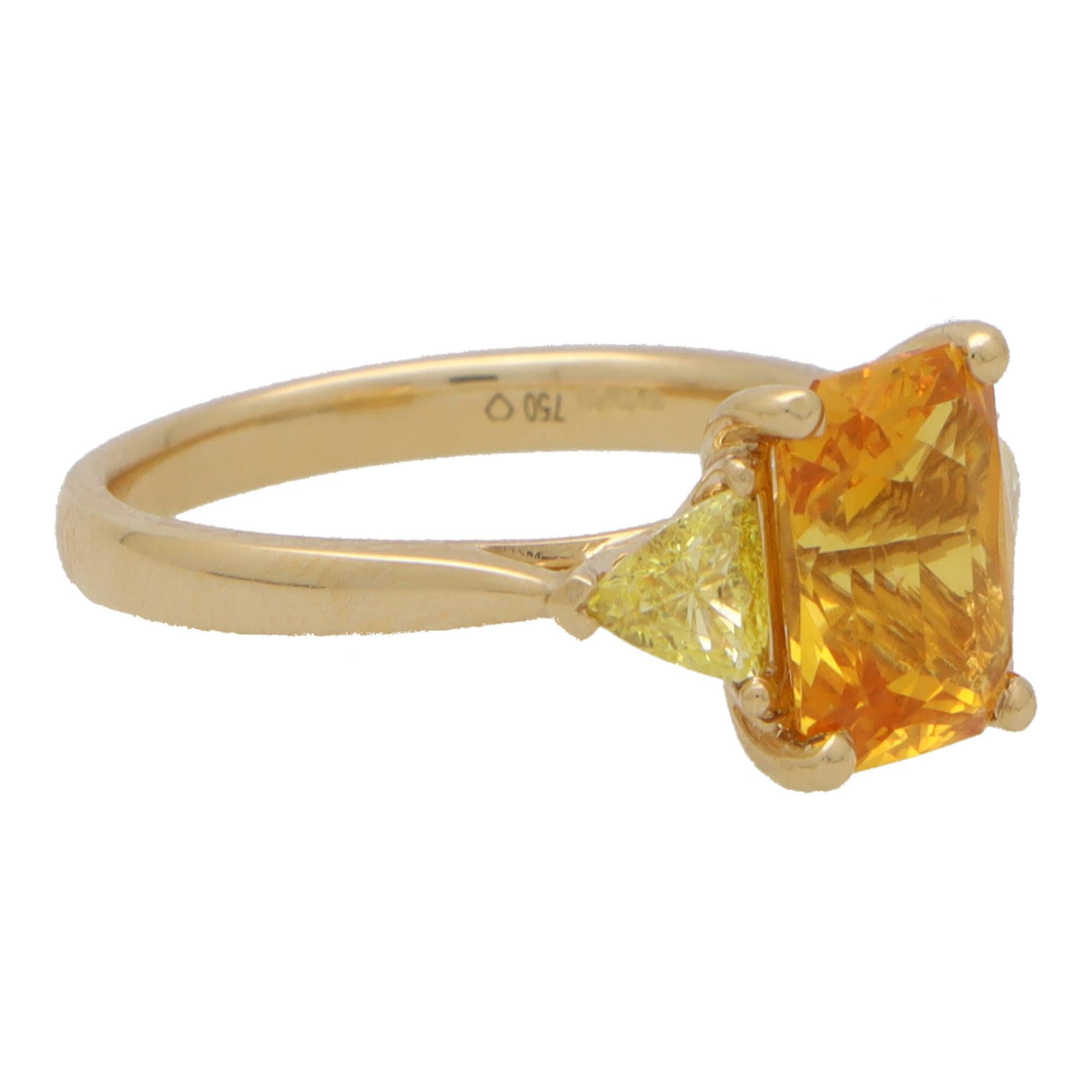 Modern Elongated Orange Sapphire and Yellow Diamond Three Stone in 18k Yellow Gold For Sale