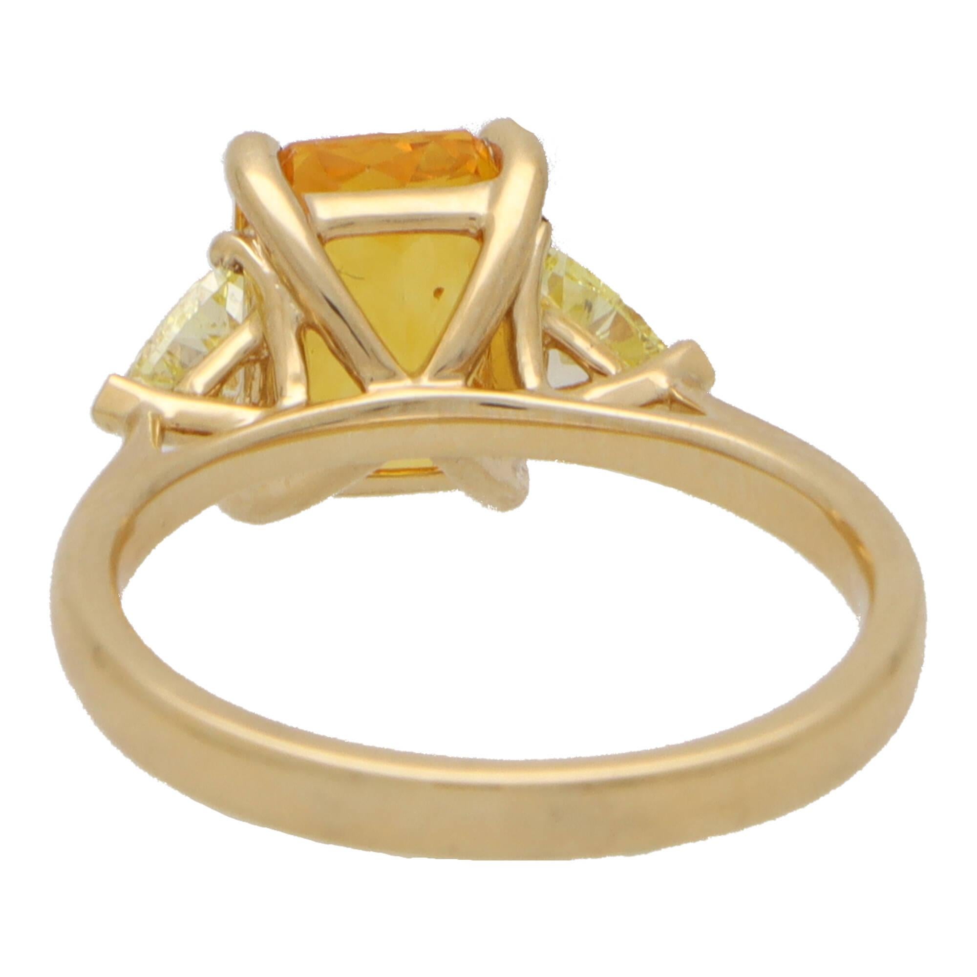 Women's or Men's Elongated Orange Sapphire and Yellow Diamond Three Stone in 18k Yellow Gold For Sale