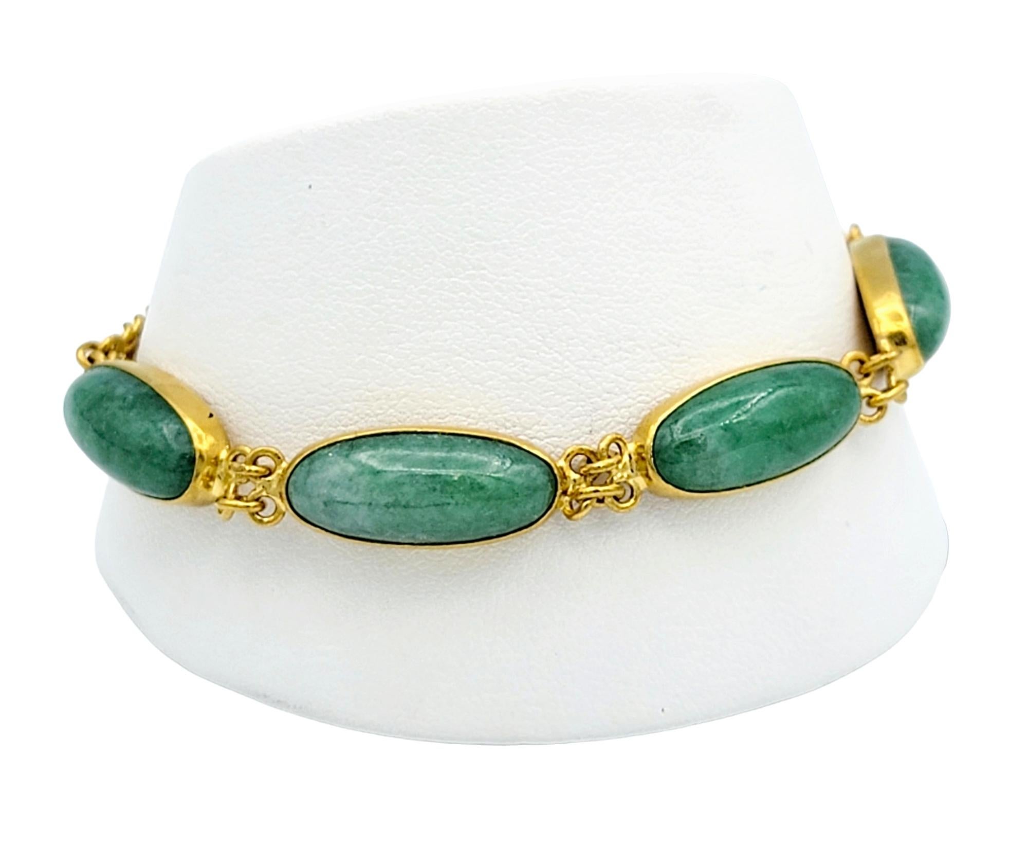 Elongated Oval Cabochon Jadeite Curb Link Bracelet Set in 24 Karat Yellow Gold  For Sale 5