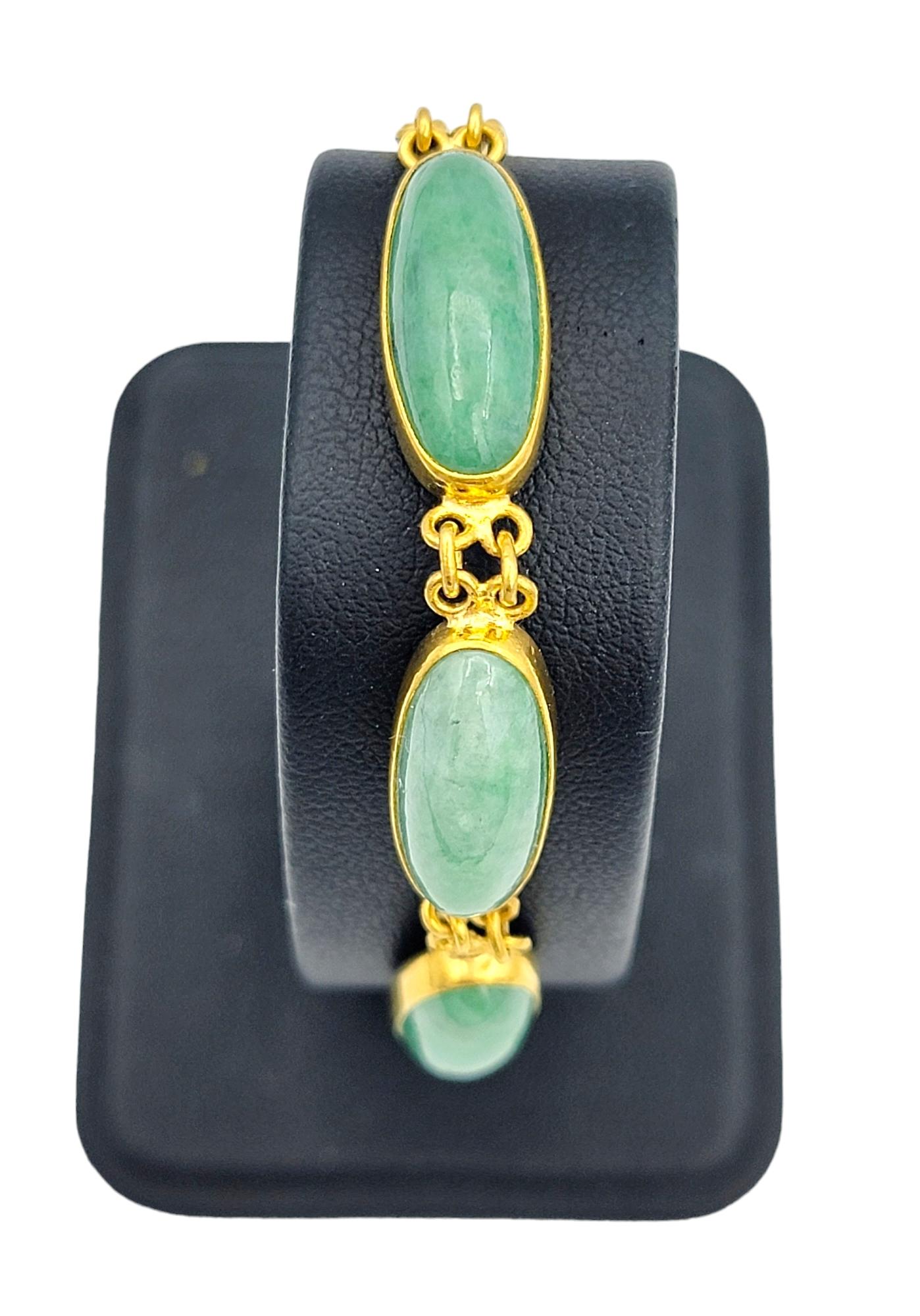 Elongated Oval Cabochon Jadeite Curb Link Bracelet Set in 24 Karat Yellow Gold  For Sale 7