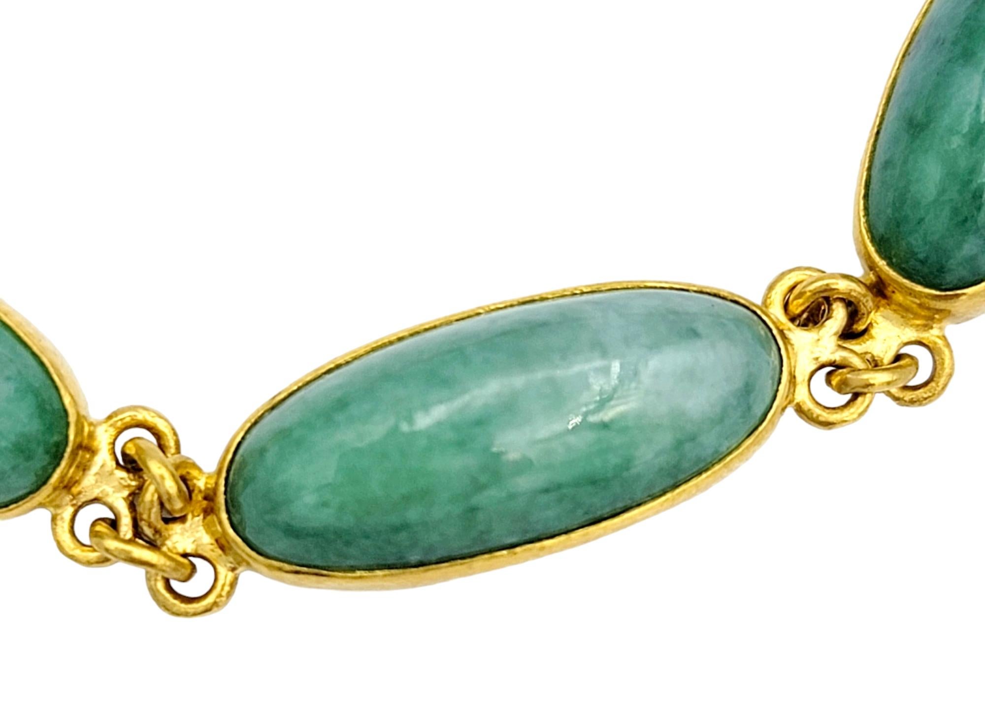 Elongated Oval Cabochon Jadeite Curb Link Bracelet Set in 24 Karat Yellow Gold  In Good Condition For Sale In Scottsdale, AZ