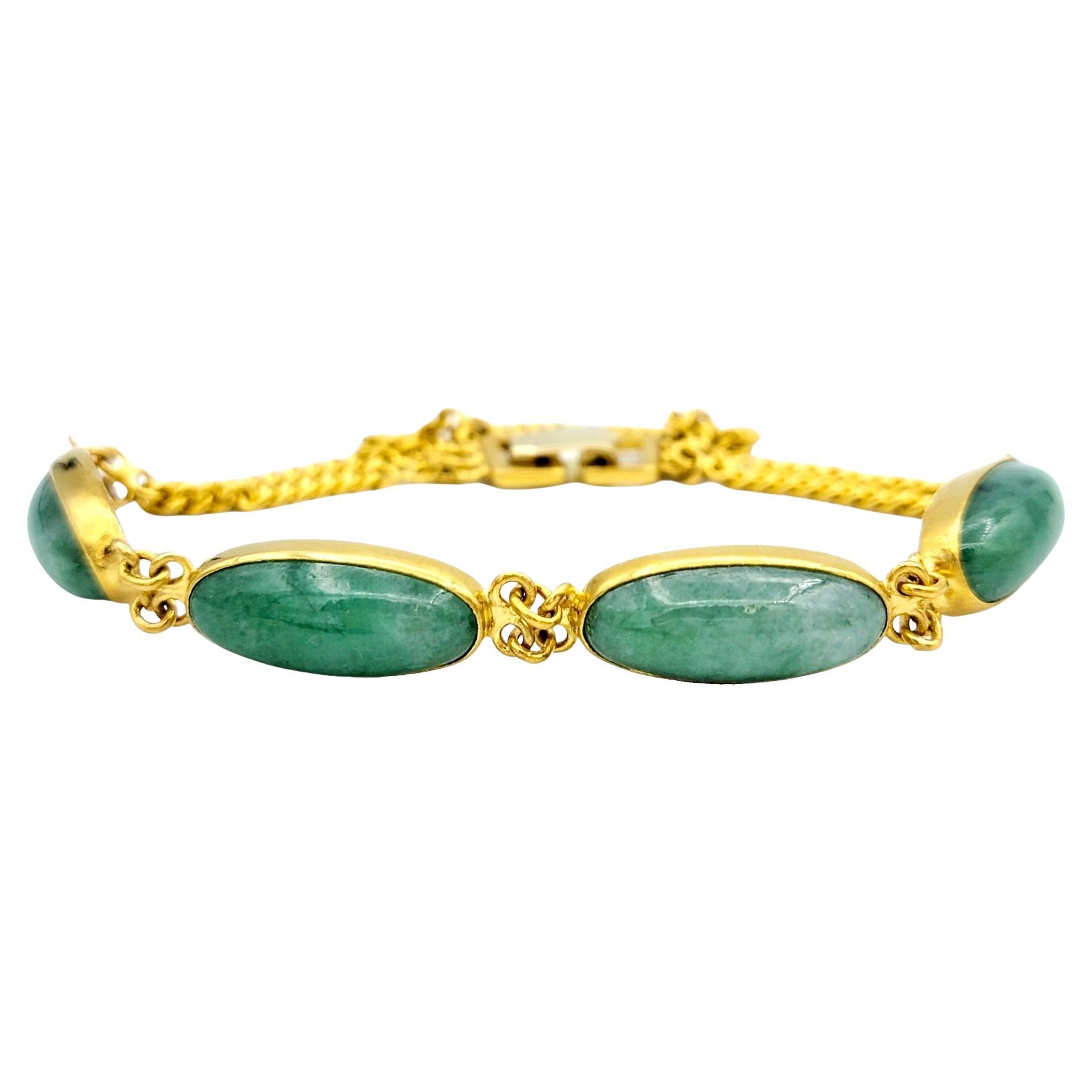 Elongated Oval Cabochon Jadeite Curb Link Bracelet Set in 24 Karat Yellow Gold  For Sale