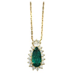 Elongated Pear Cut Emerald & Diamond Halo Pendant Necklace 18 Karat Yellow Gold