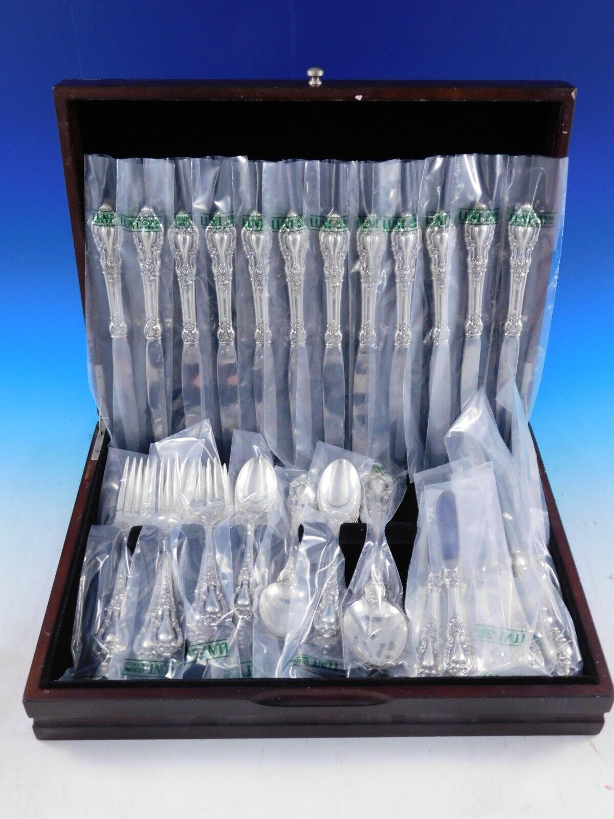 The elegance and quality of Lunt sterling flatware is evident in the Eloquence pattern. This is Lunt's most popular pattern and features pierced handles and baroque motifs.
Unused Eloquence by Lunt sterling silver Flatware set, 58 pieces. This set