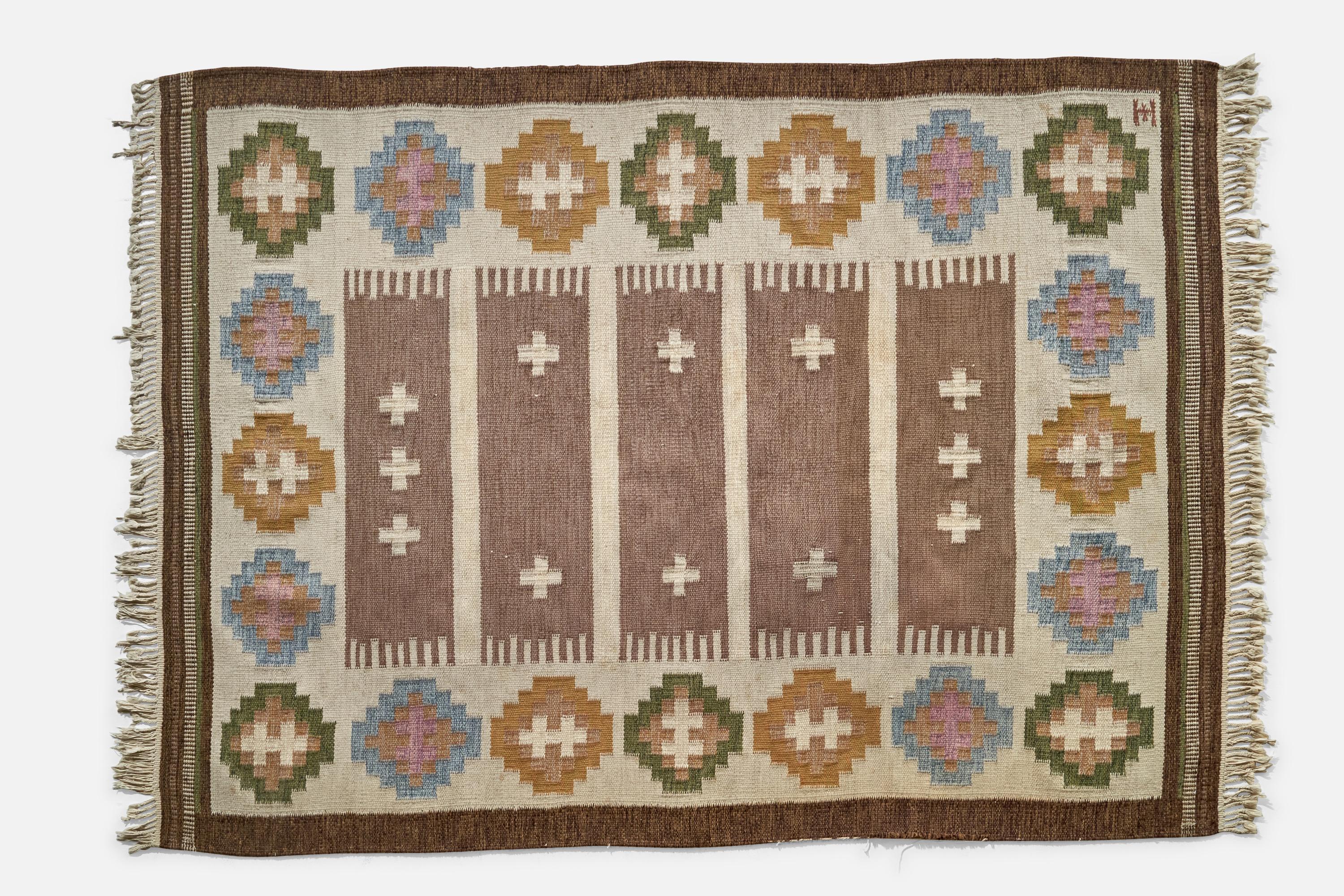 Alfombra de lana multicolor diseñada y producida por Elsa Ekholm, Suecia, c. 1960.

