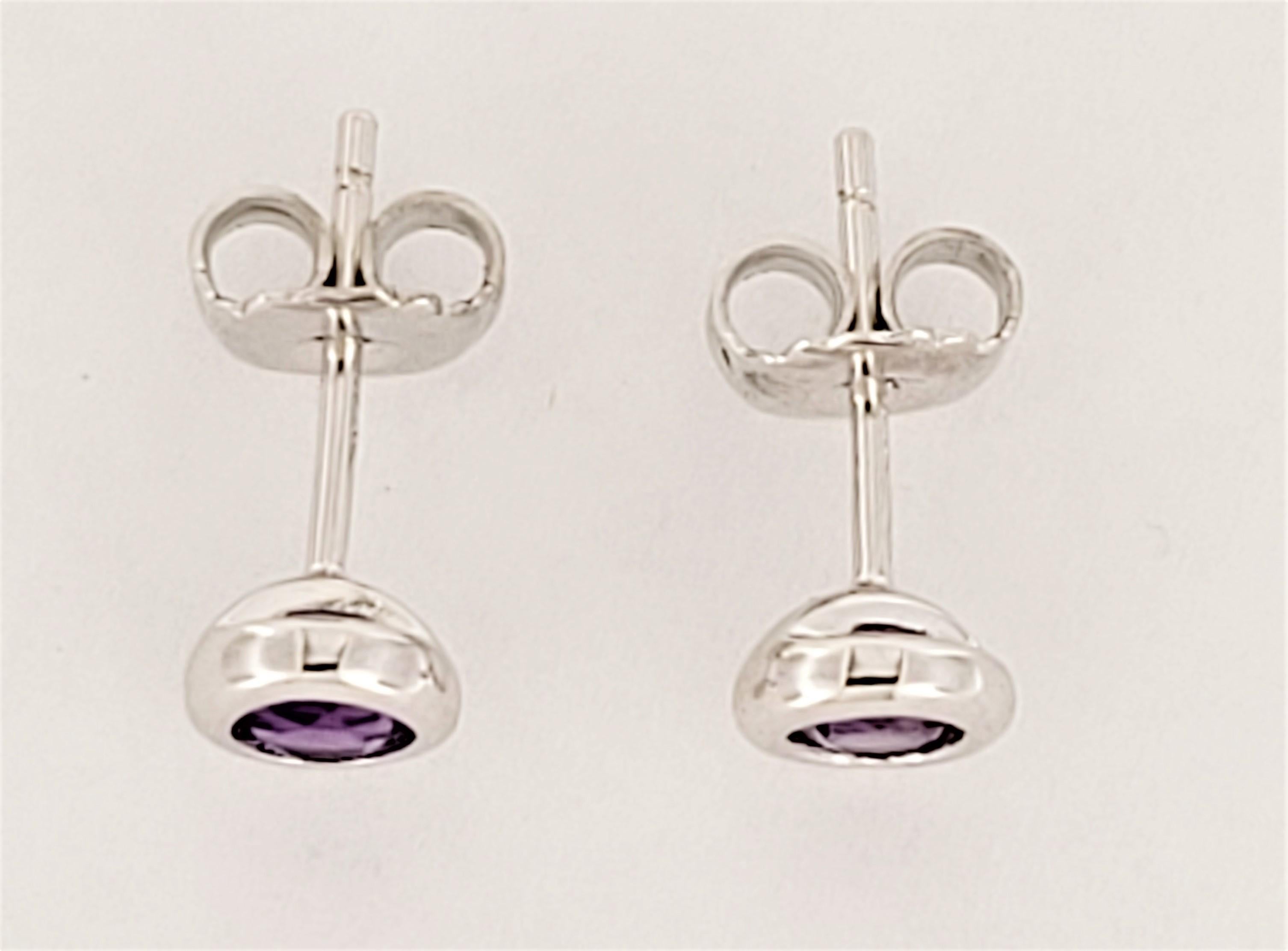 Brand  Elsa Peretti
Material Sterling Silver 925
Two Round Amethysts .28 tcw
Earrings Dimension: 5.5mm
Condition New
Comes with Tiffany & Co pouch
Retail Price: $945