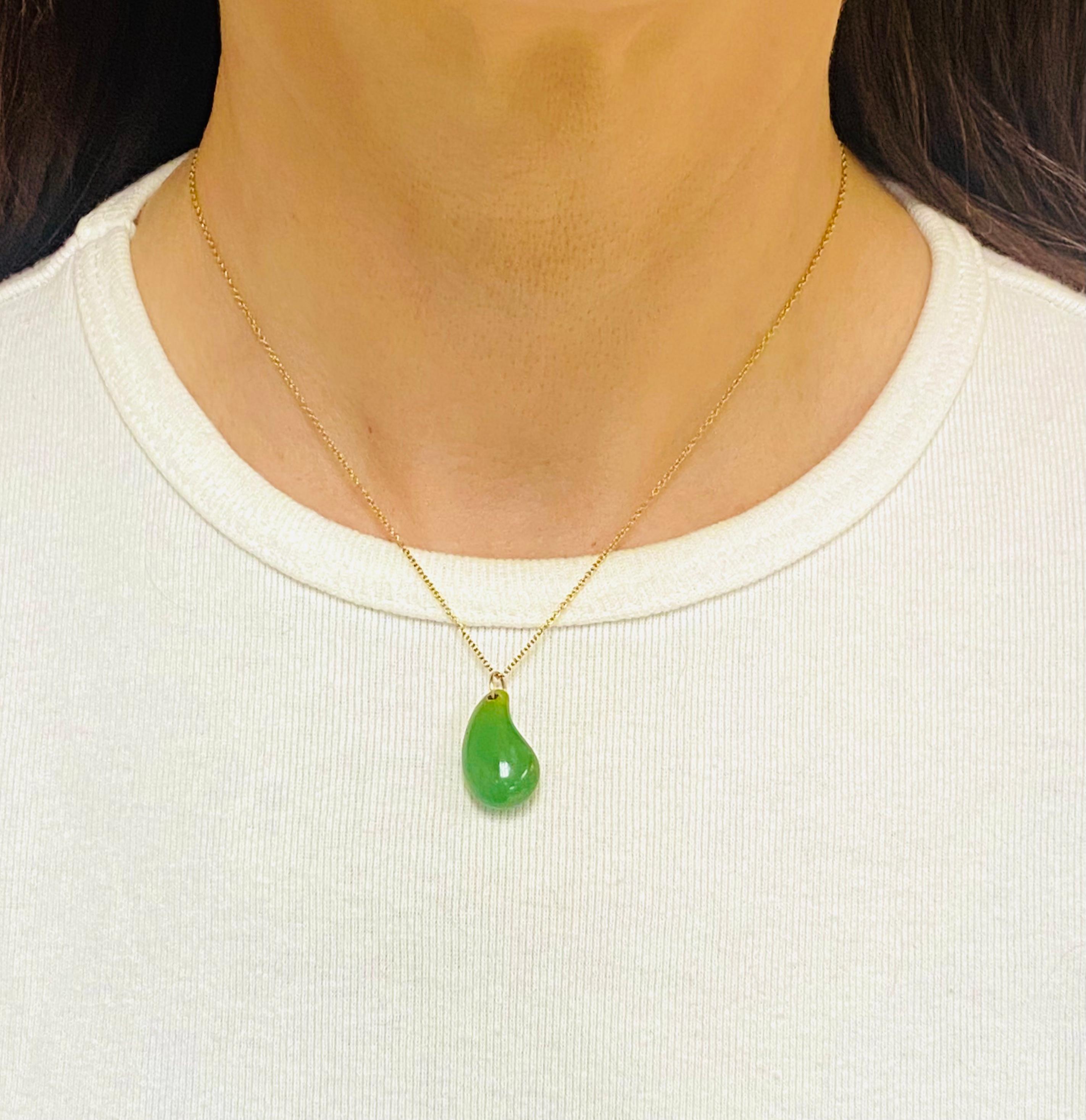 DESIGNER: Elsa Peretti for Tiffany & Co.
CIRCA: 1980’s
MATERIALS: 18K Yellow  Gold
GEMSTONE: Jade
WEIGHT:  5.3 grams
MEASUREMENTS: Chain - 16
