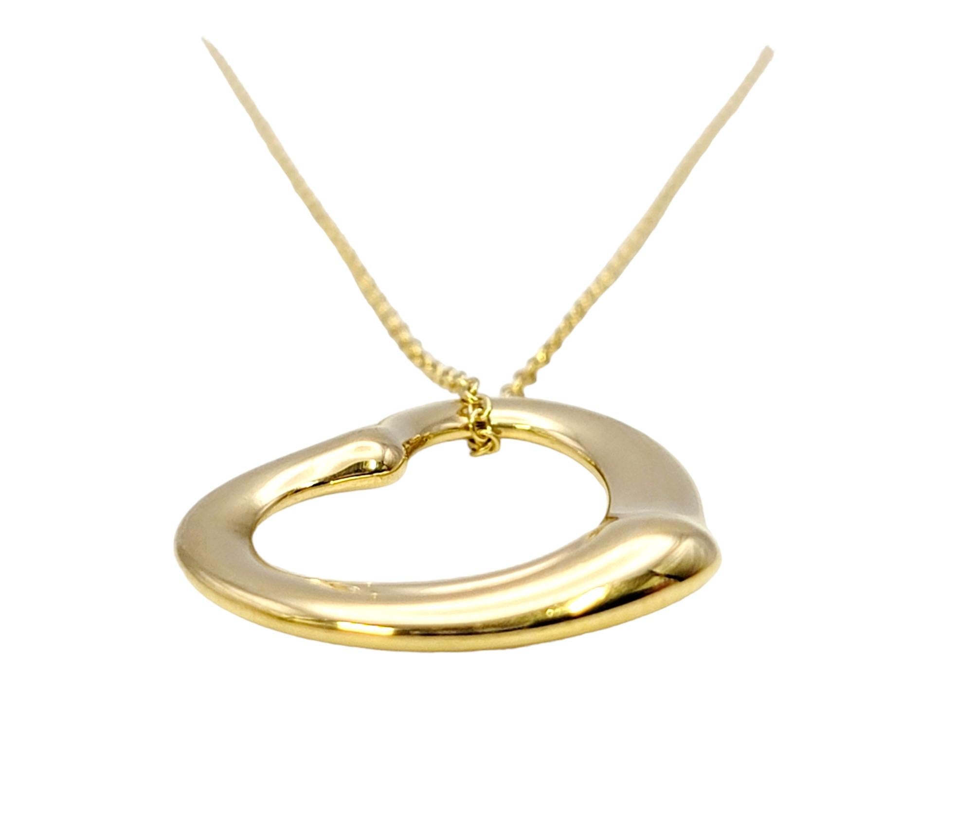Elsa Peretti for Tiffany & Co. 18 Karat Yellow Gold Open Heart Pendant Necklace In Good Condition For Sale In Scottsdale, AZ