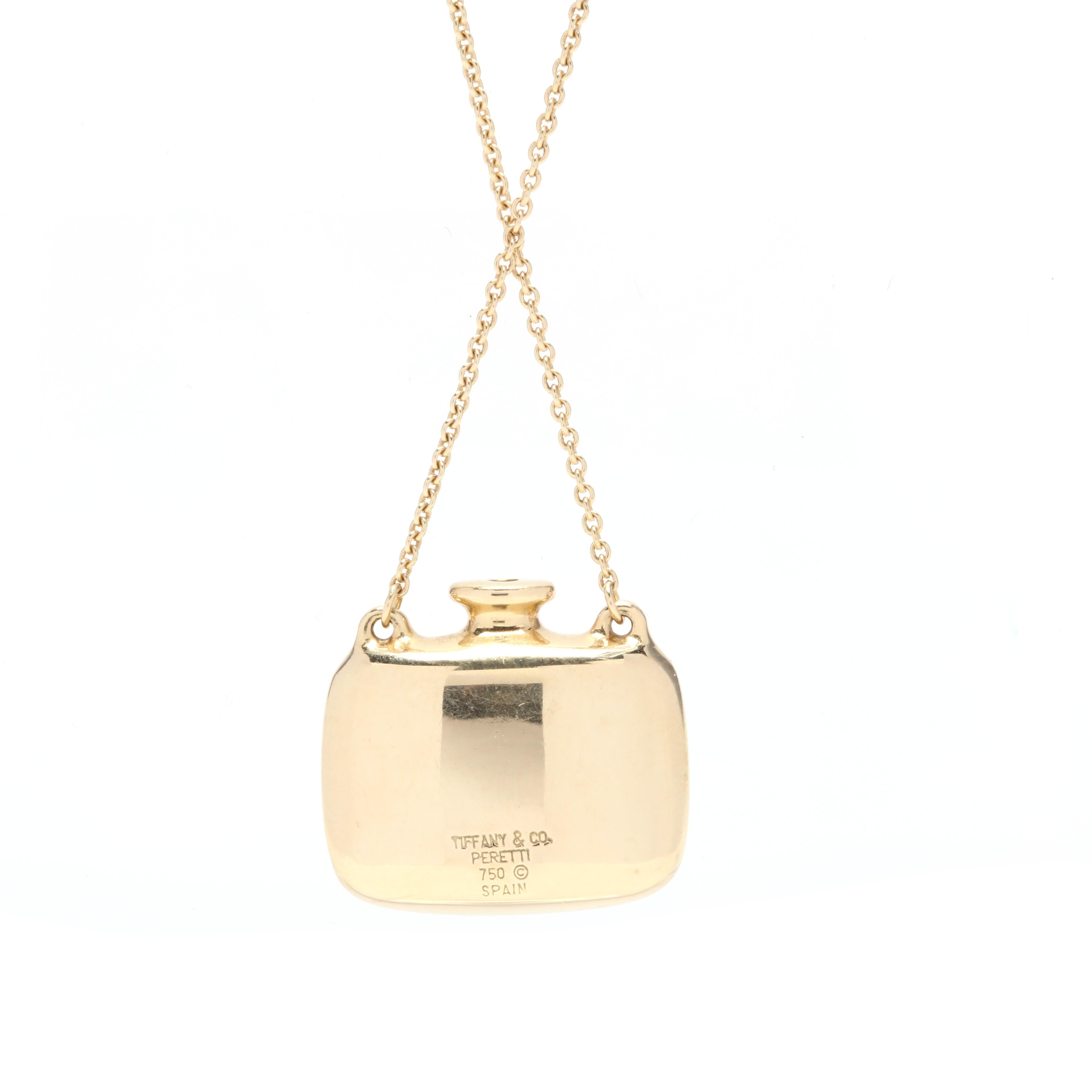 An Elsa Peretti for Tiffany & Co 18 karat yellow gold open bottle pendant necklace. This necklace features a rectangular perfume bottle motif suspended from a thin rolo chain.

Chain Length: 24.75 in.

Pendant Length: 5/8 in.

Pendant Width: 3/4