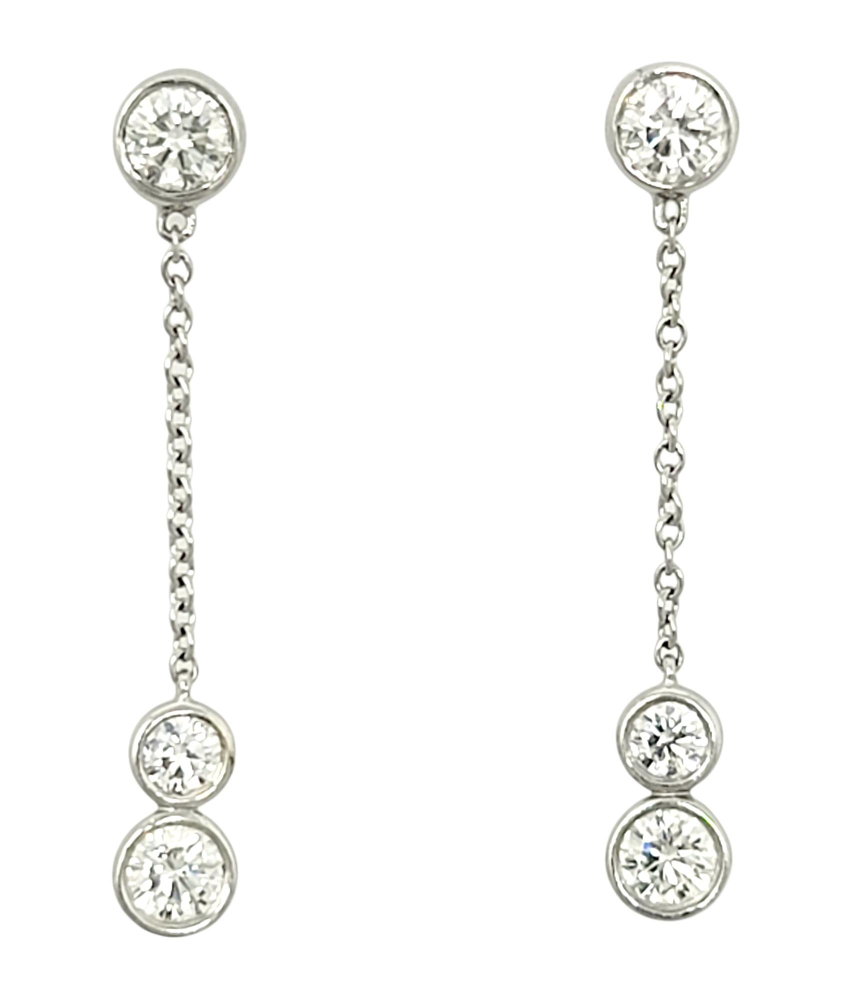Gorgeous diamond dangle earrings from Elsa Peretti's 'Diamonds by the Yard' collection for Tiffany & Co.. The delicate style and gentle movement make these sparkling beauties dance in the light! 

Earring type: Dangle
Metal: Platinum 
Weight: 3.4