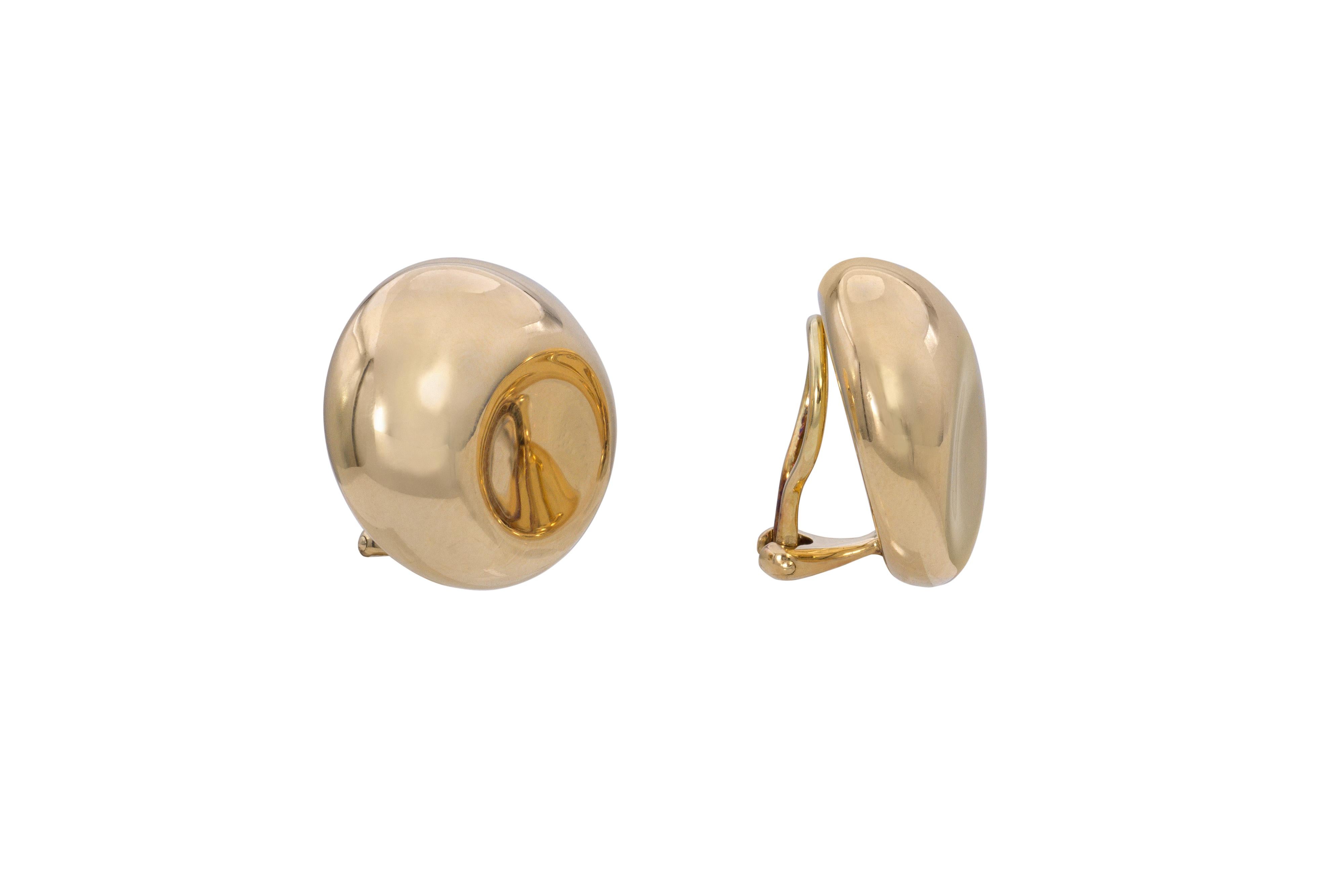 A pair concave and convex 18 karat gold 